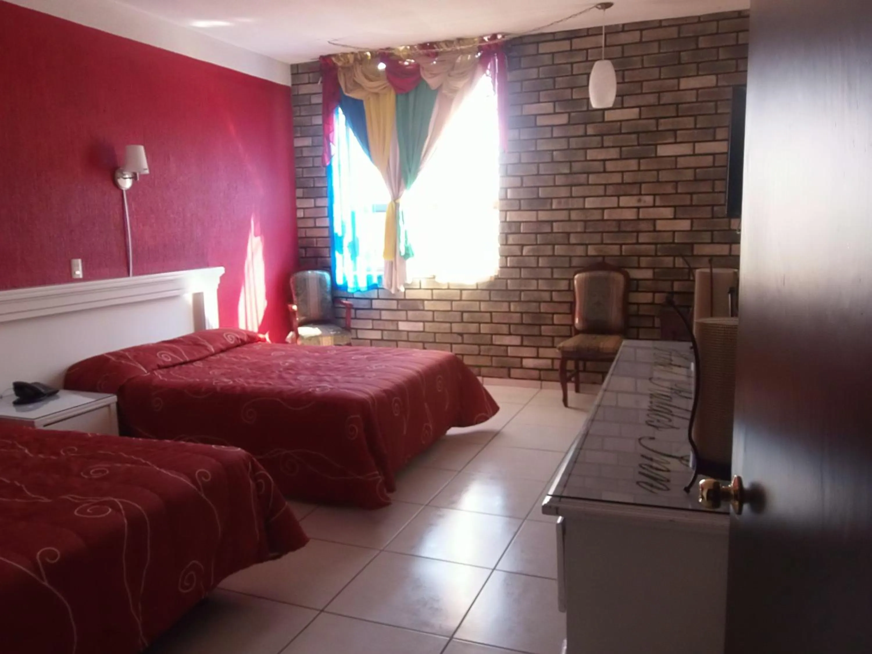 Bedroom in Hotel Raldos Inn