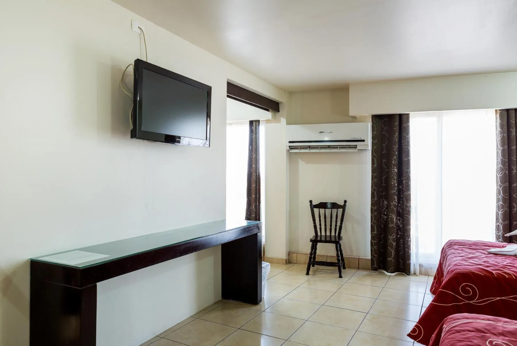 Bedroom in Hotel Raldos Inn
