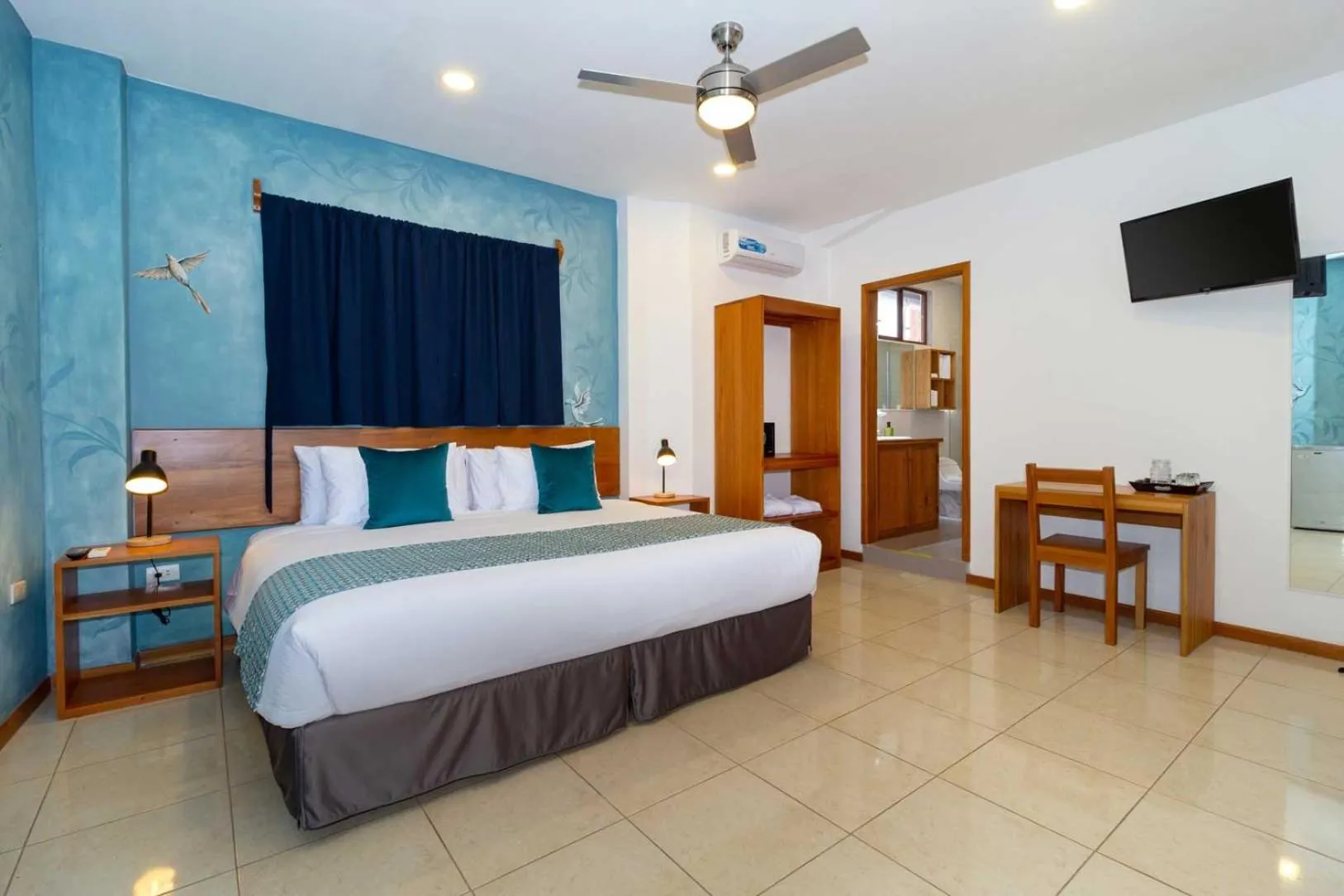 Bed in Plaza Luna Suites