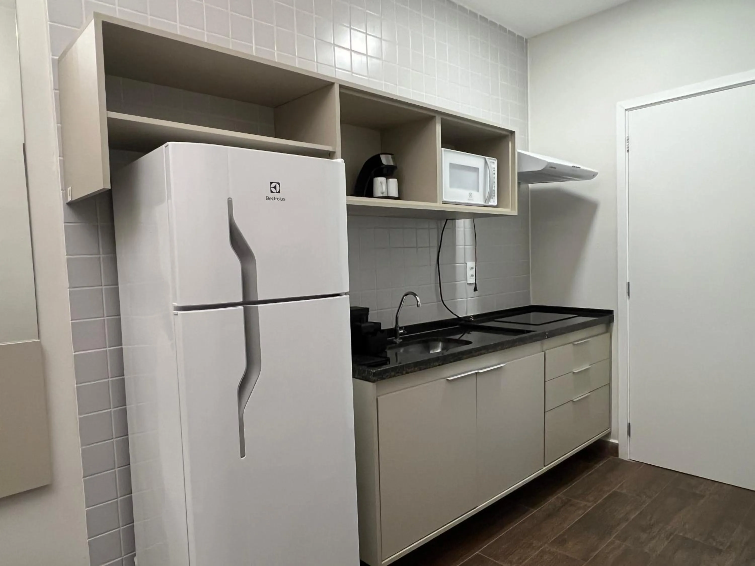 Kitchen or kitchenette in eSuites Sorocaba