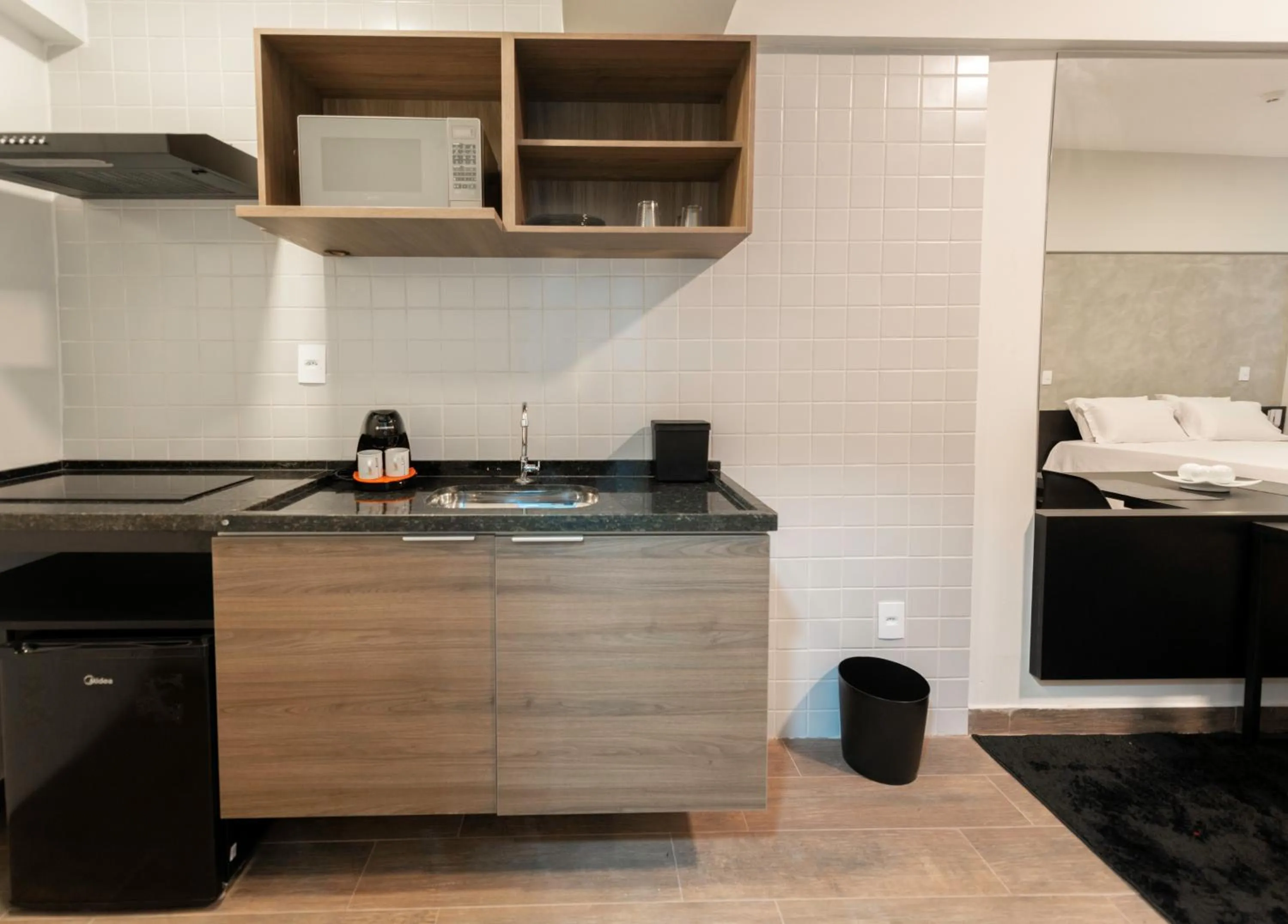 Kitchen or kitchenette in eSuites Sorocaba