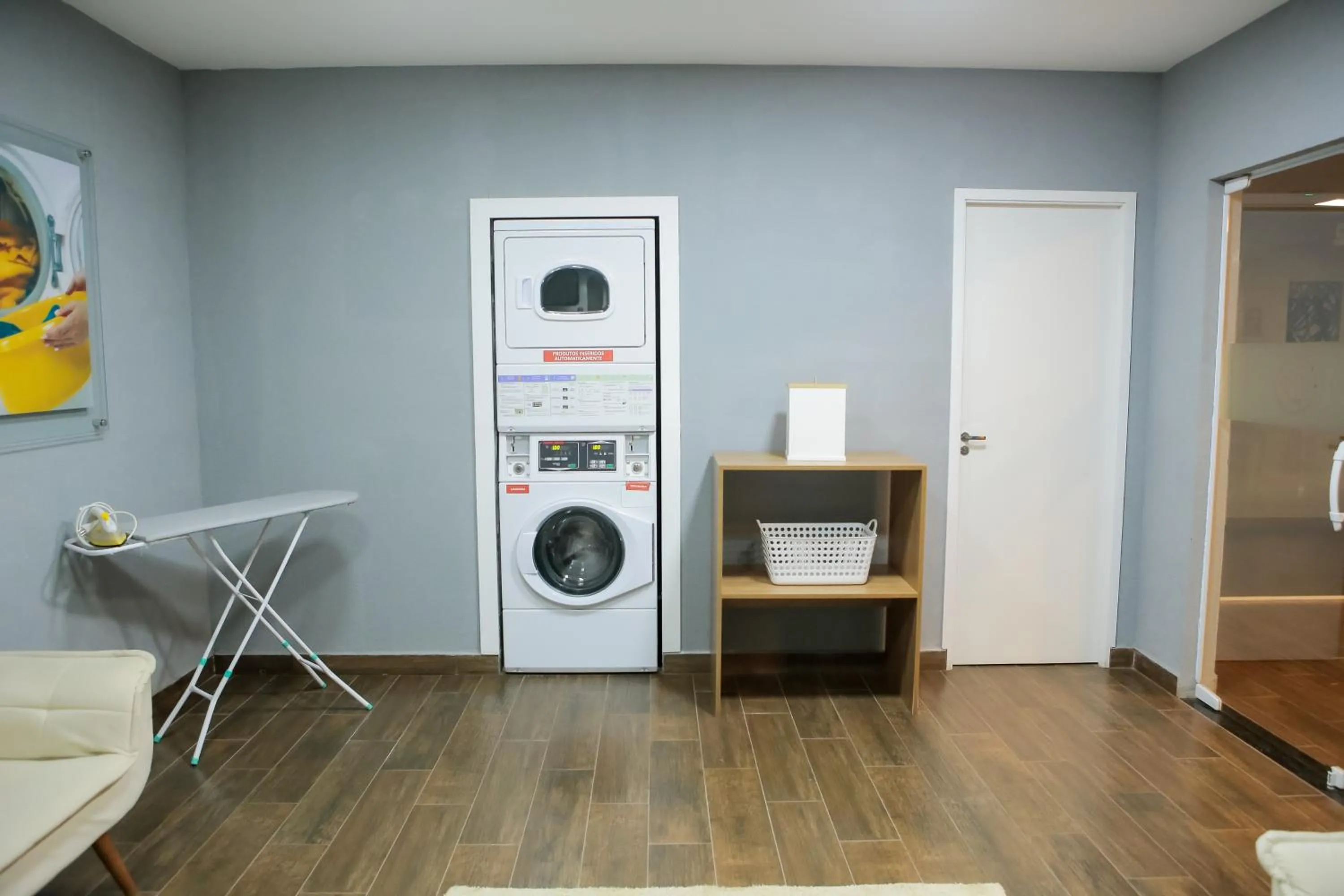 washing machine in eSuites Sorocaba