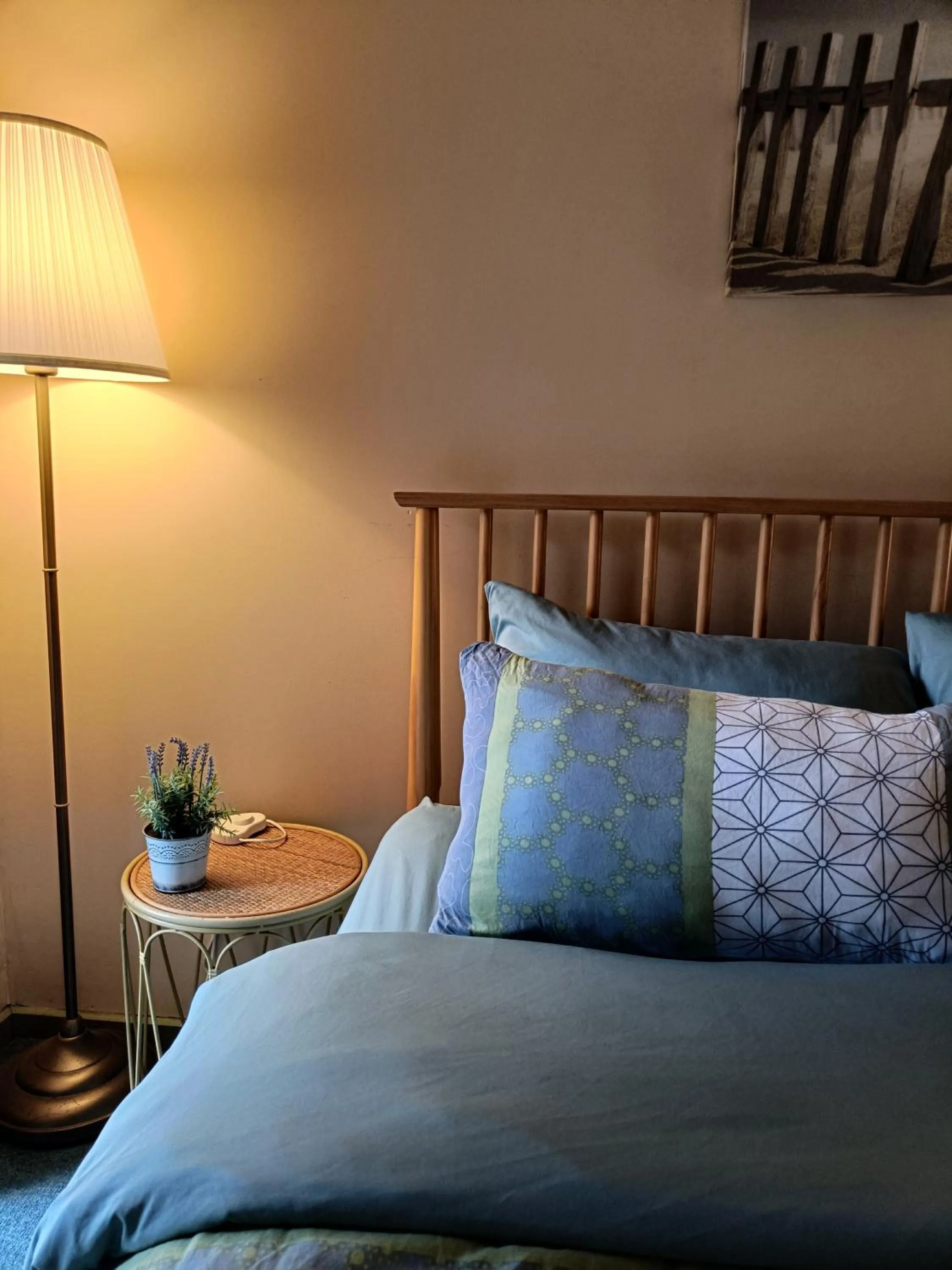 Bed in Kalimna Woods Cottages