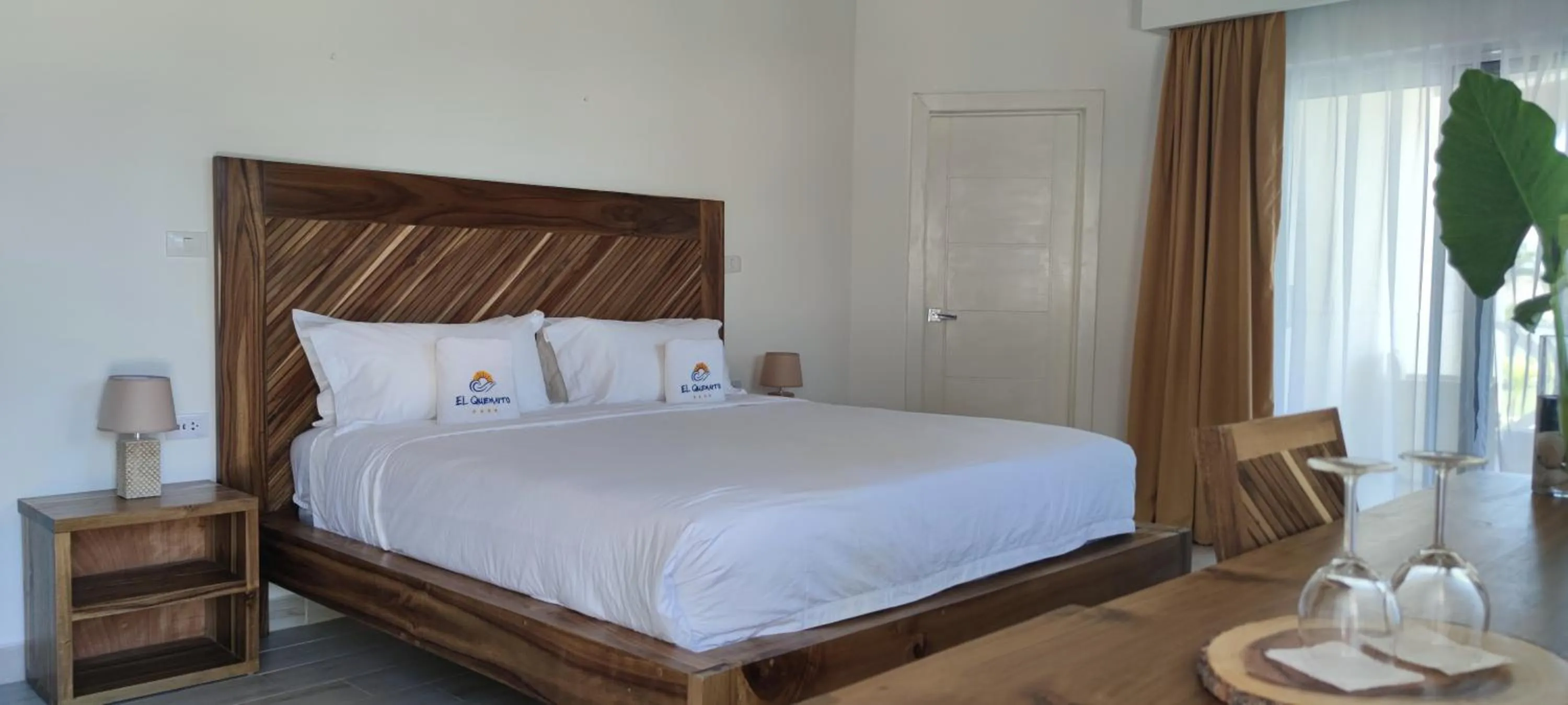 Bed in Hotel El Quemaito - Luxury Oceanfront Retreat