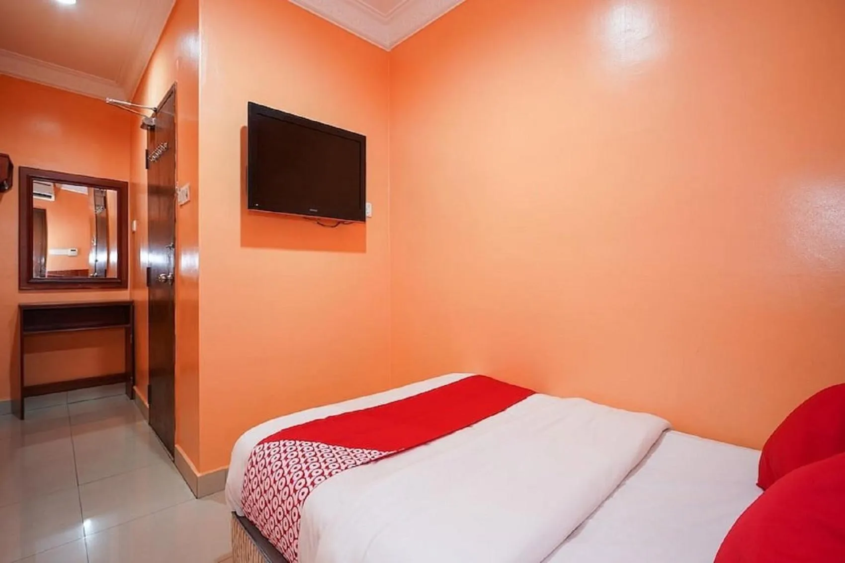 Bed in Bercam Times Inn Hotel