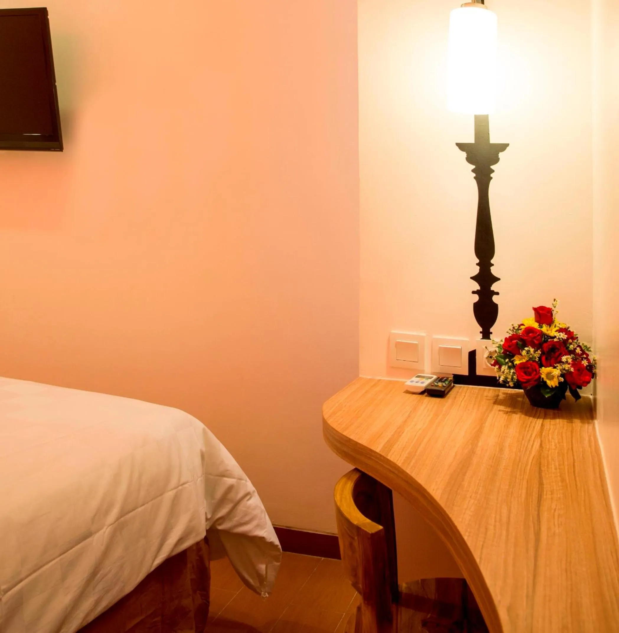 Seating area, Bed in DeMira Hotel