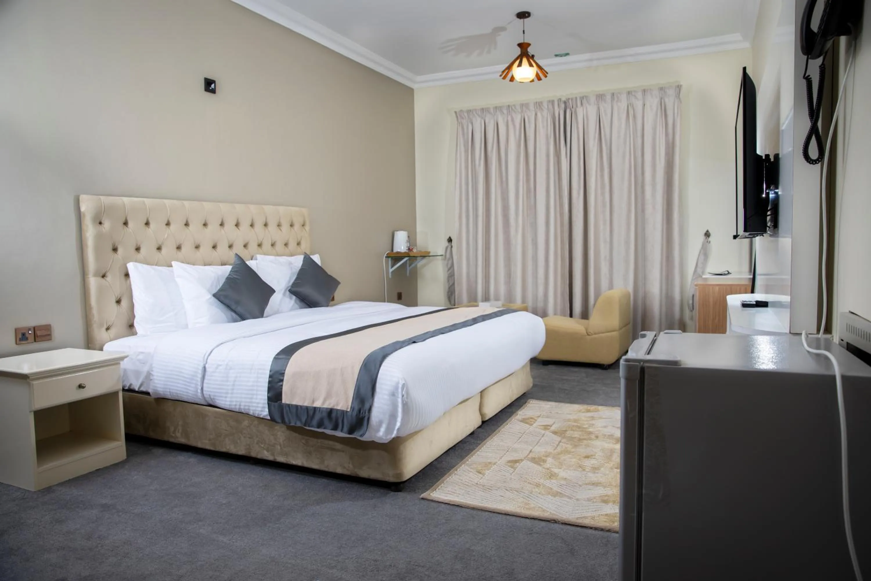 Bed in Sea Shore Hotel Apartment Khorfakkan