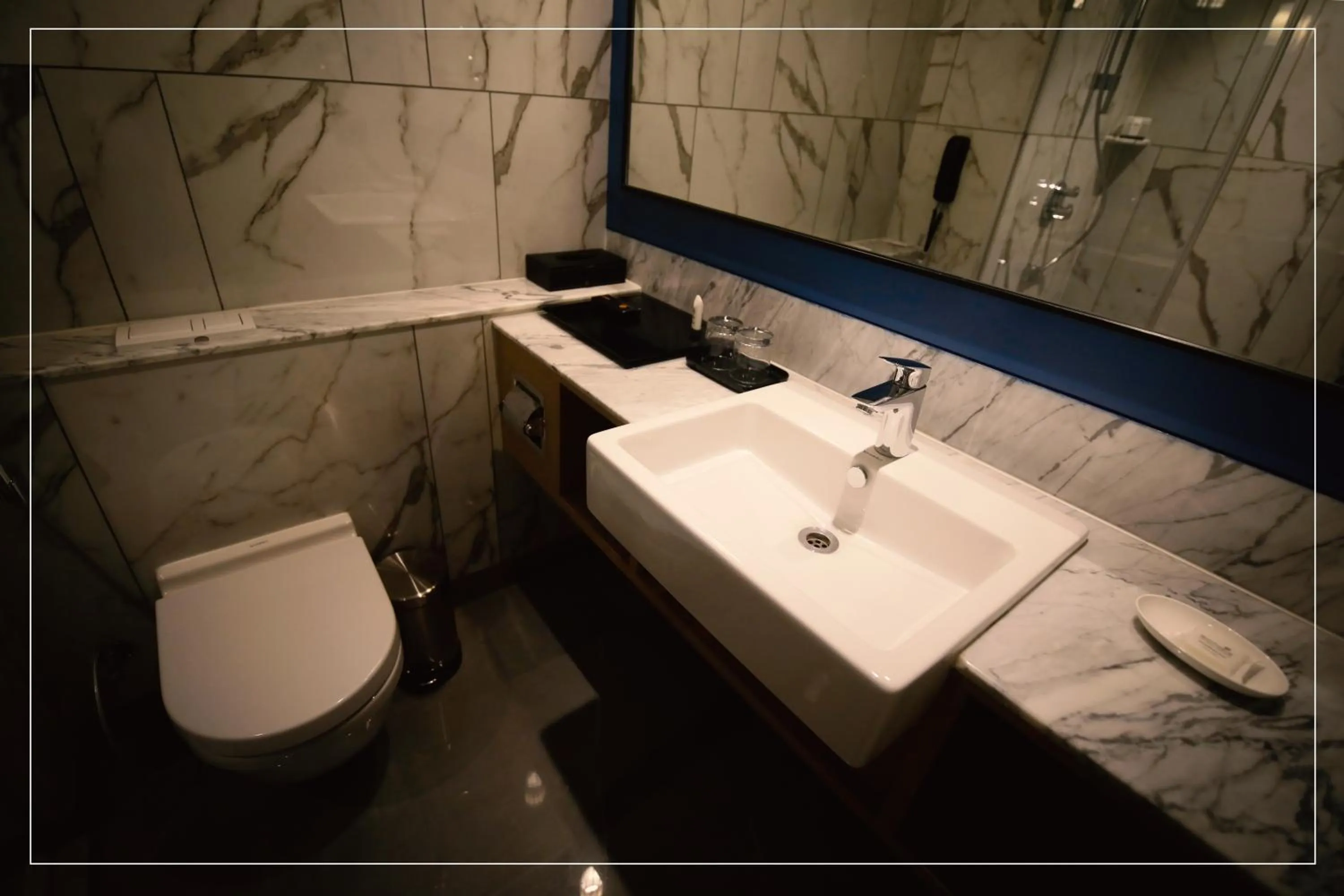 Bathroom in Ramada Encore by Wyndham Siliguri Sevoke Road