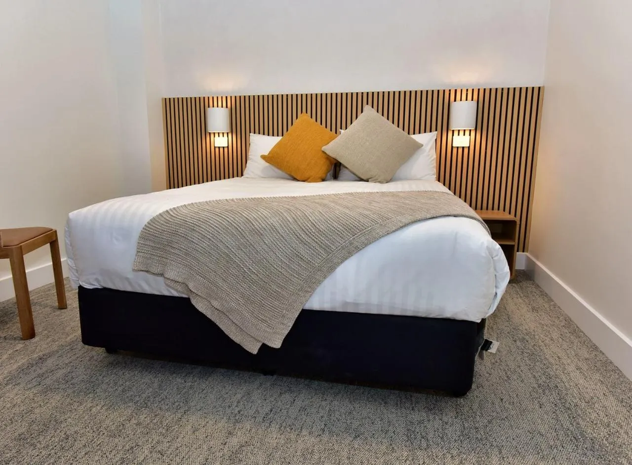 Bed in Lufra Beachside Hotel