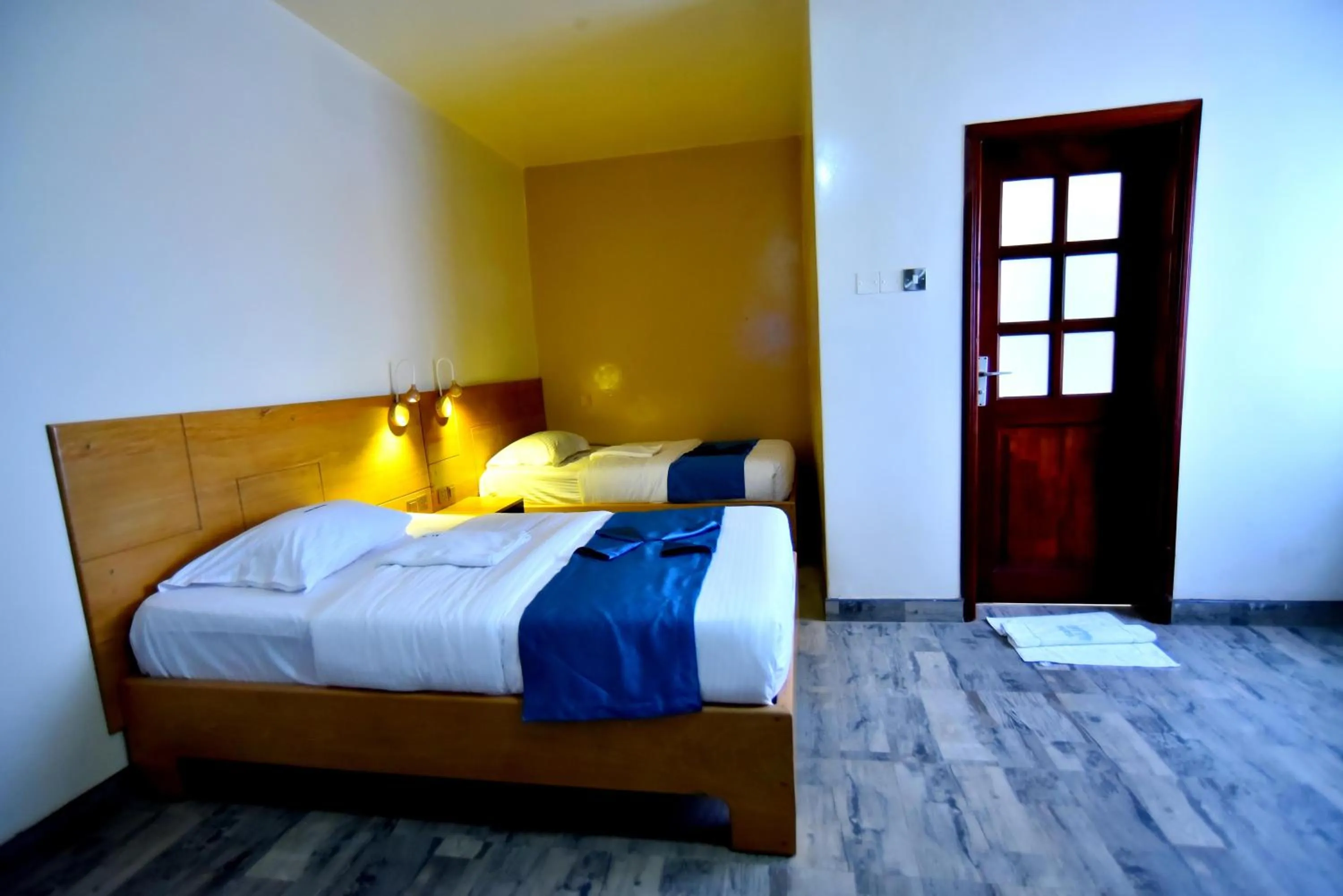 Bed in Victoria Mews Hotel