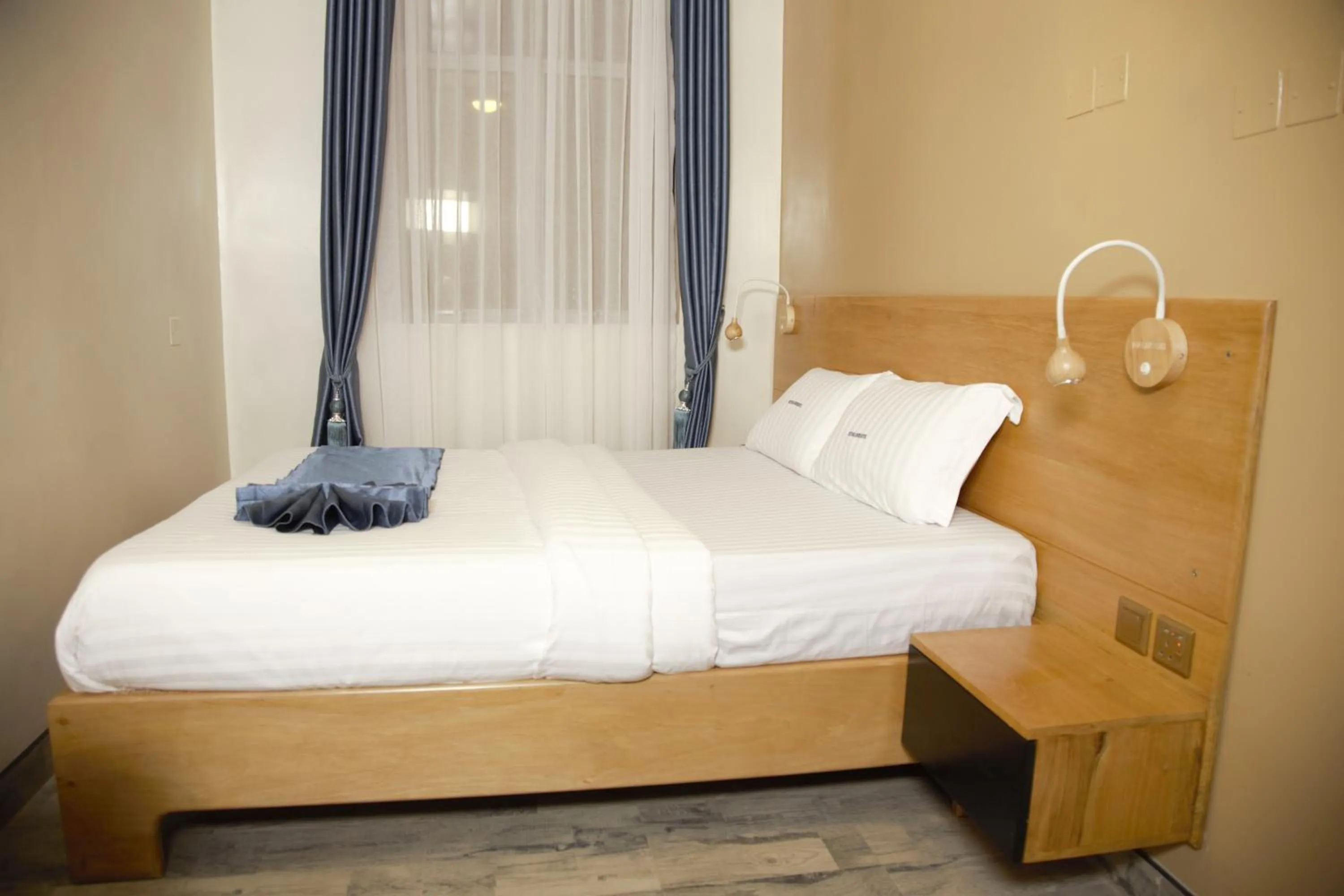 Bed in Victoria Mews Hotel