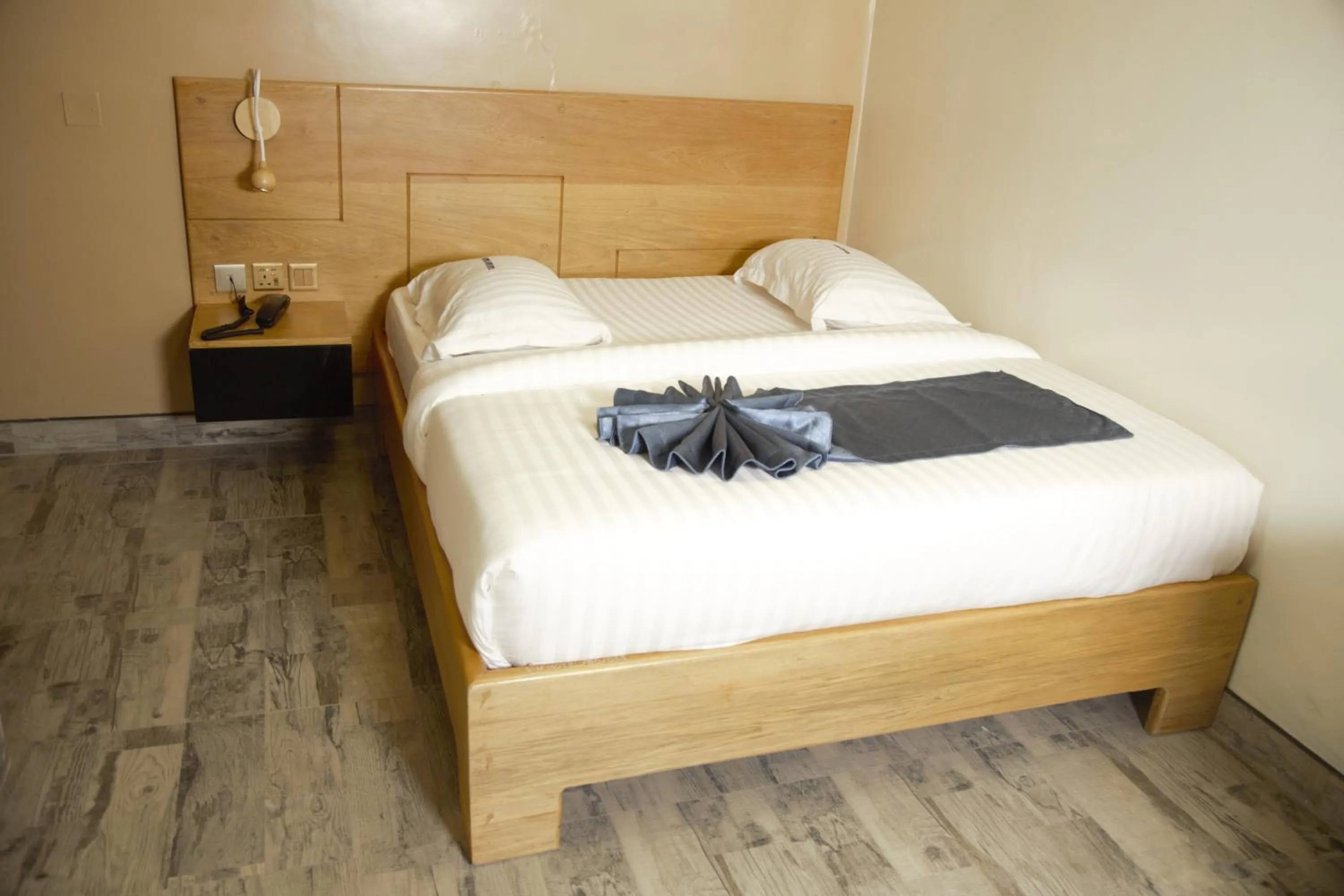 Bed in Victoria Mews Hotel