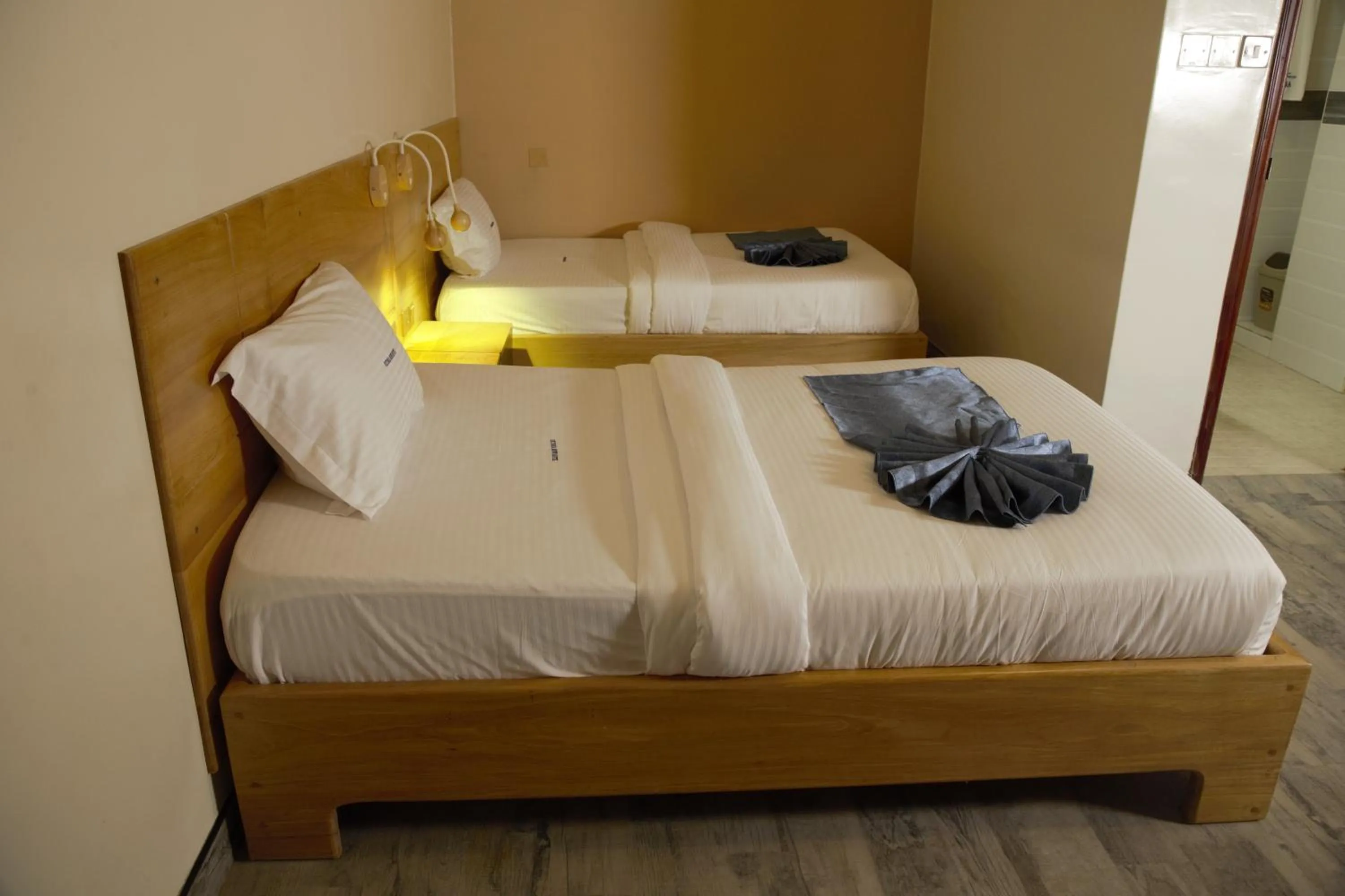 Bed in Victoria Mews Hotel