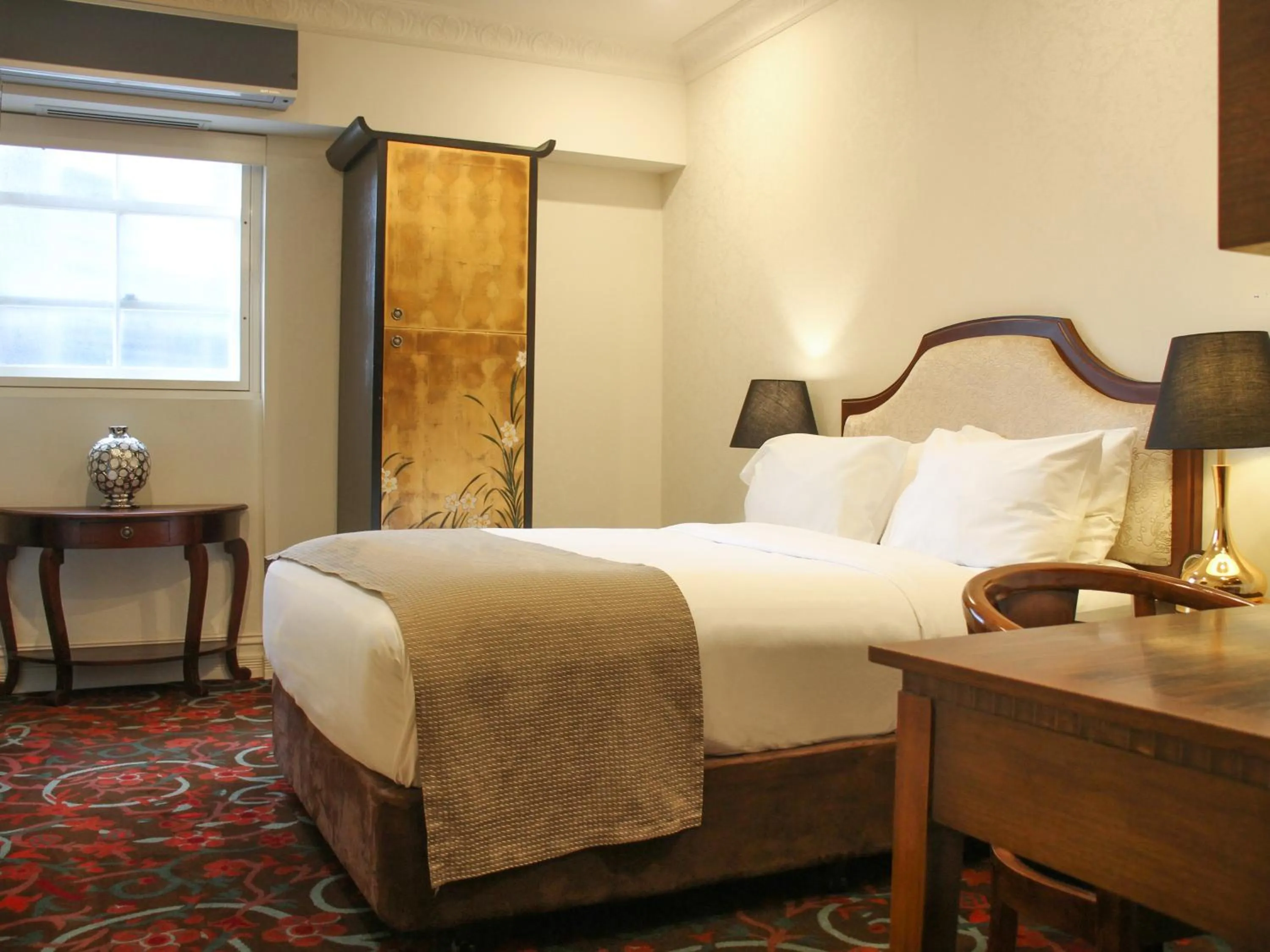 Bed in The Terrace Hotel