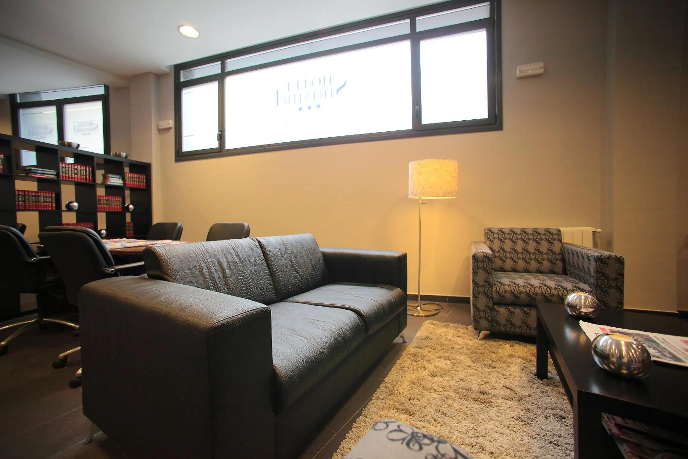 Communal lounge/ TV room in Hotel Silken Sirimiri