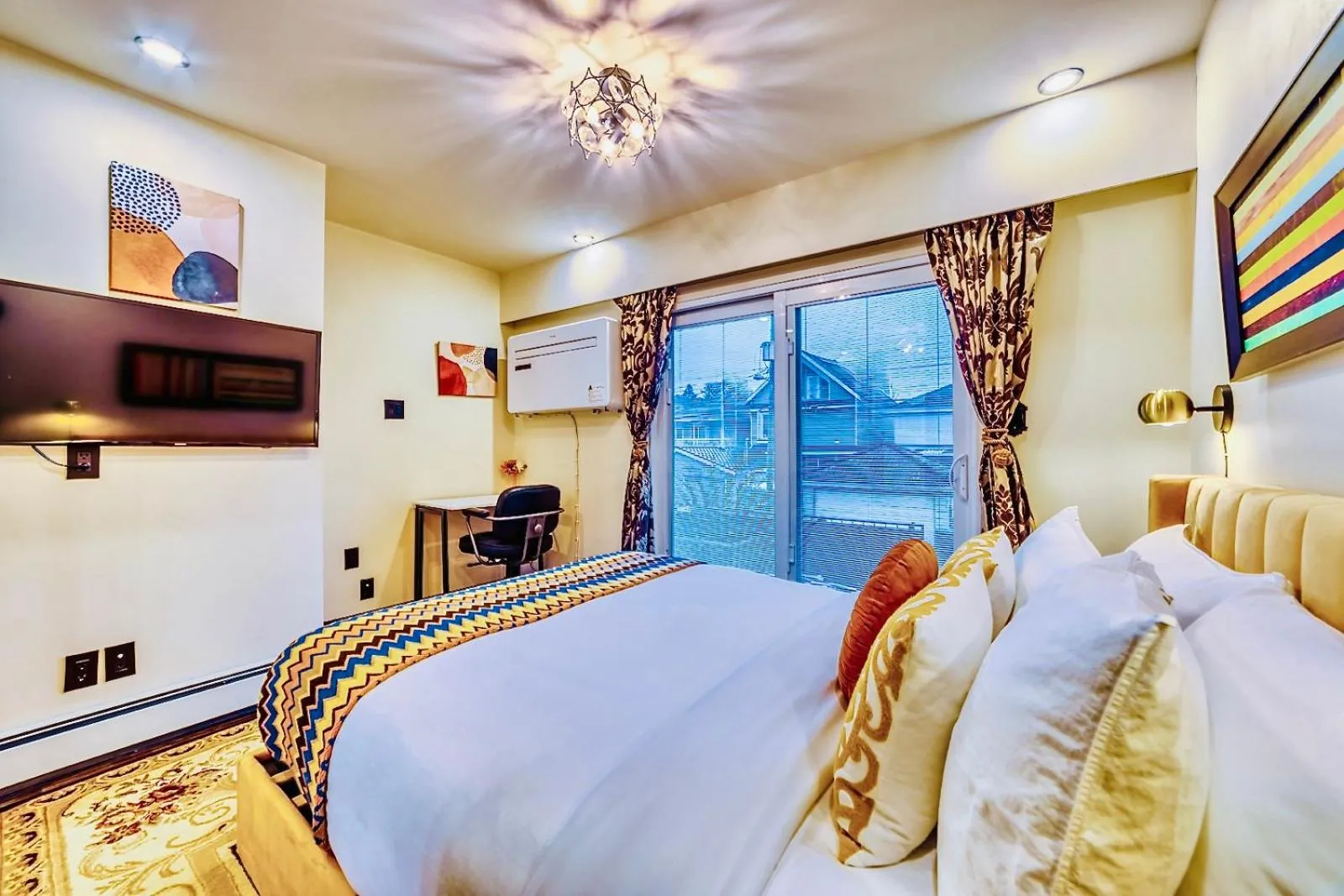 Bed in Neocolonial Nouveau Kensington Vacation Home