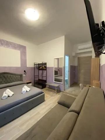 Communal lounge/ TV room, Bed in Cinemovie Guesthouse