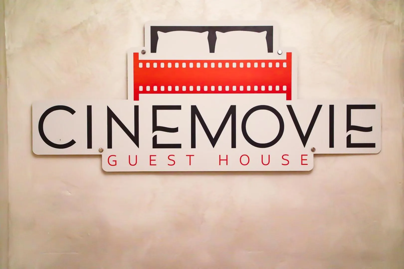 Property logo or sign in Cinemovie Guesthouse
