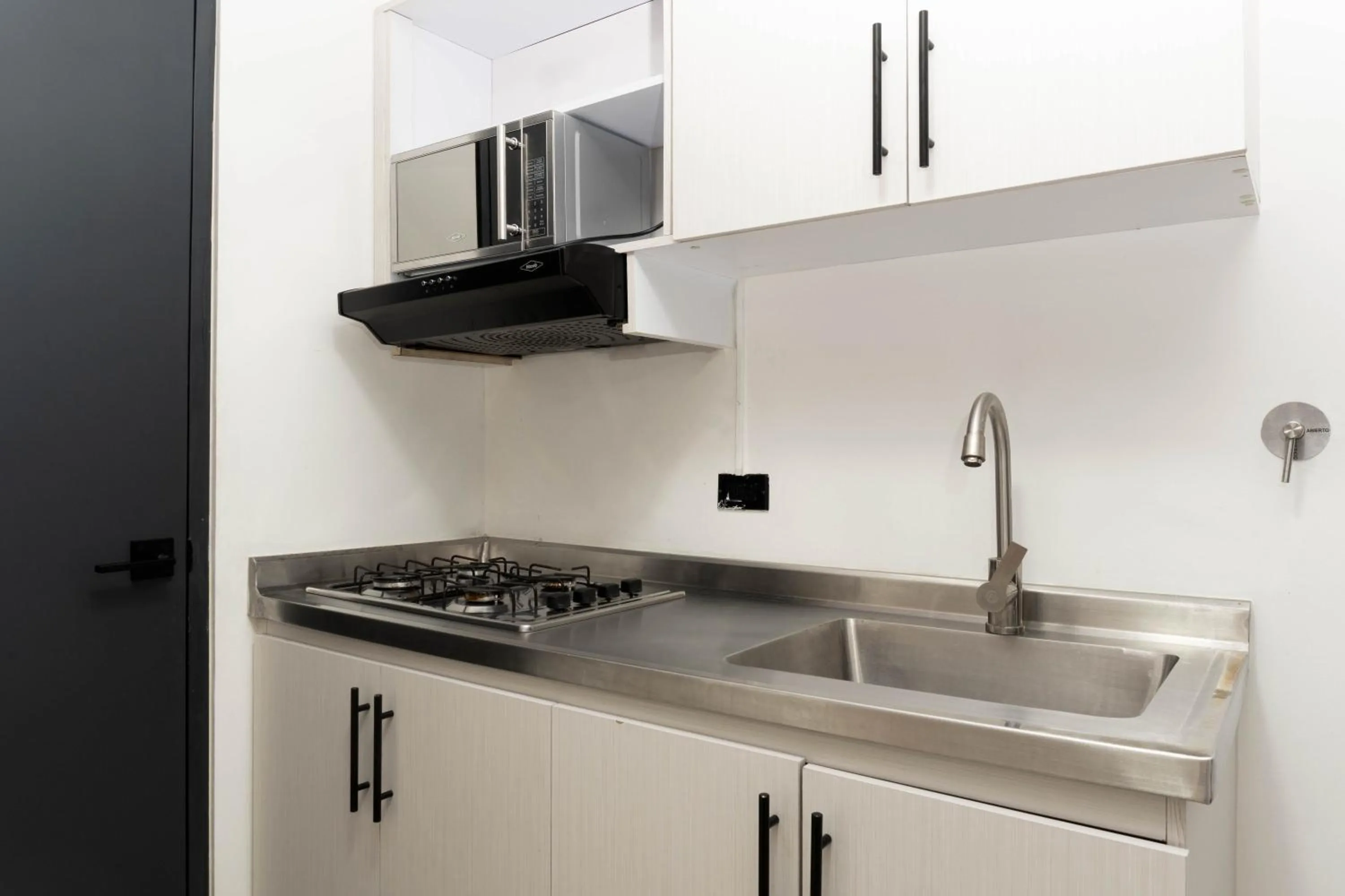 Kitchen or kitchenette in Hotel Ofix