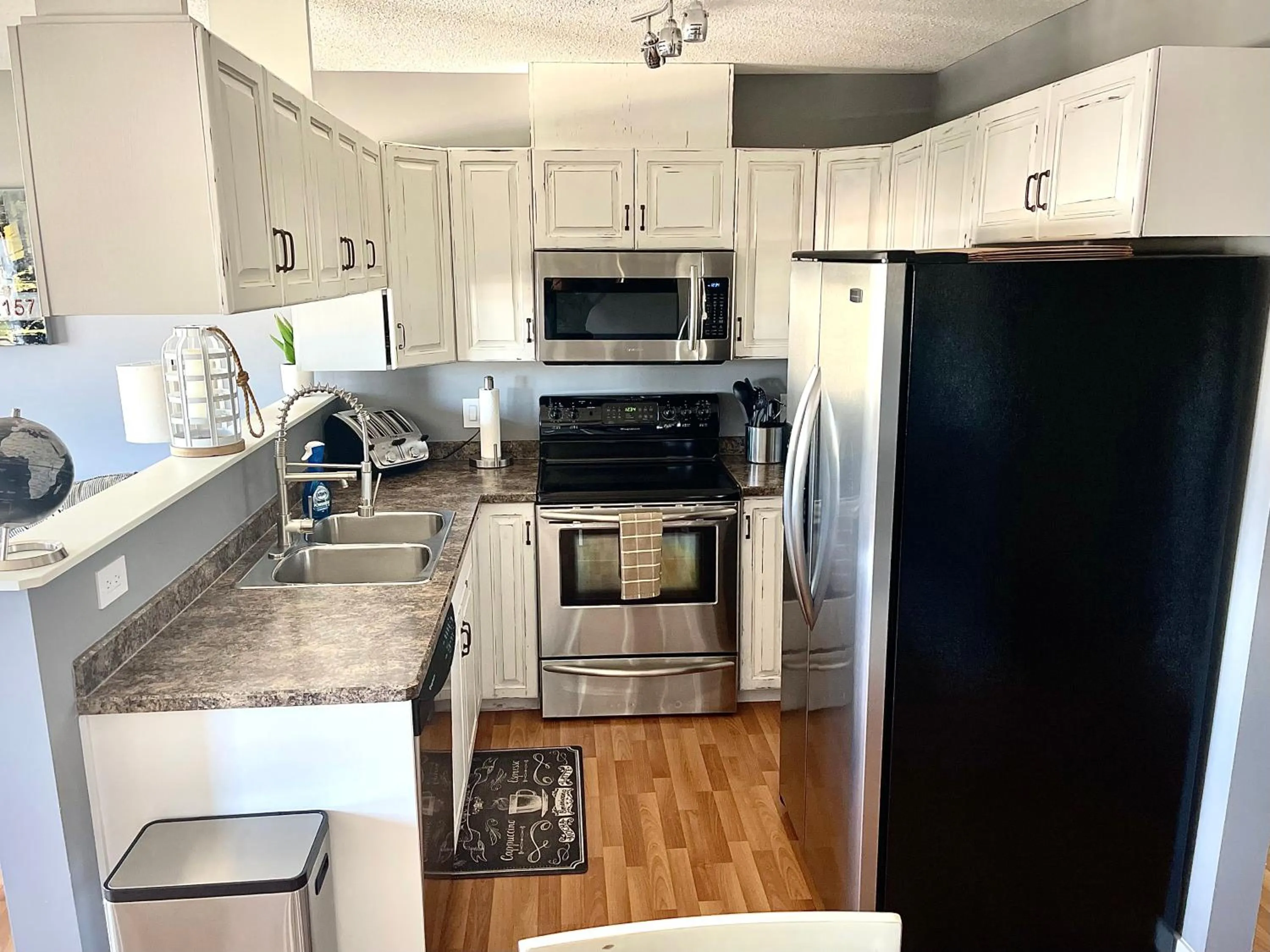 kitchen in Top Floor Riverfront Condo with Stellar Sunsets!