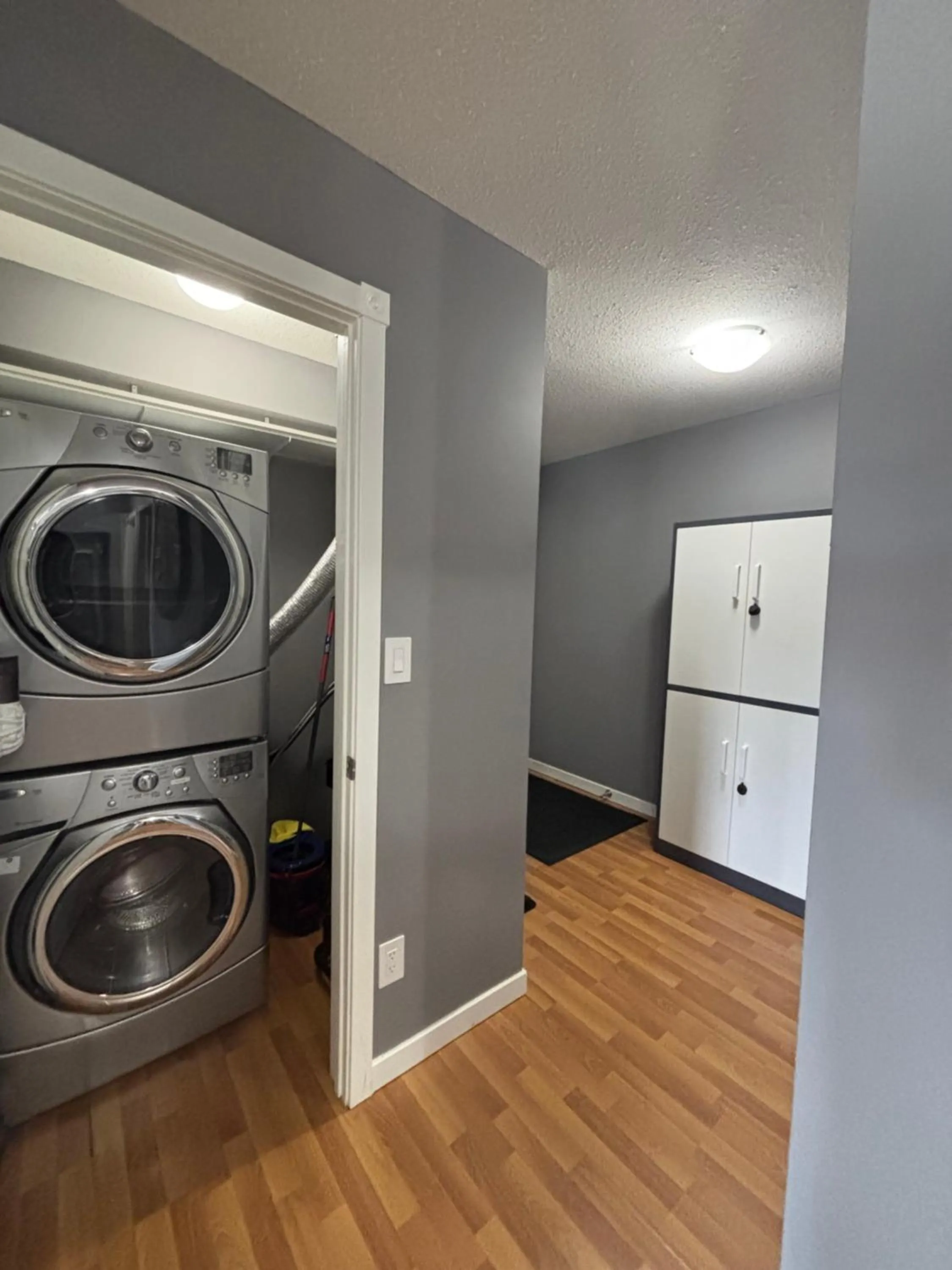laundry in Top Floor Riverfront Condo with Stellar Sunsets!