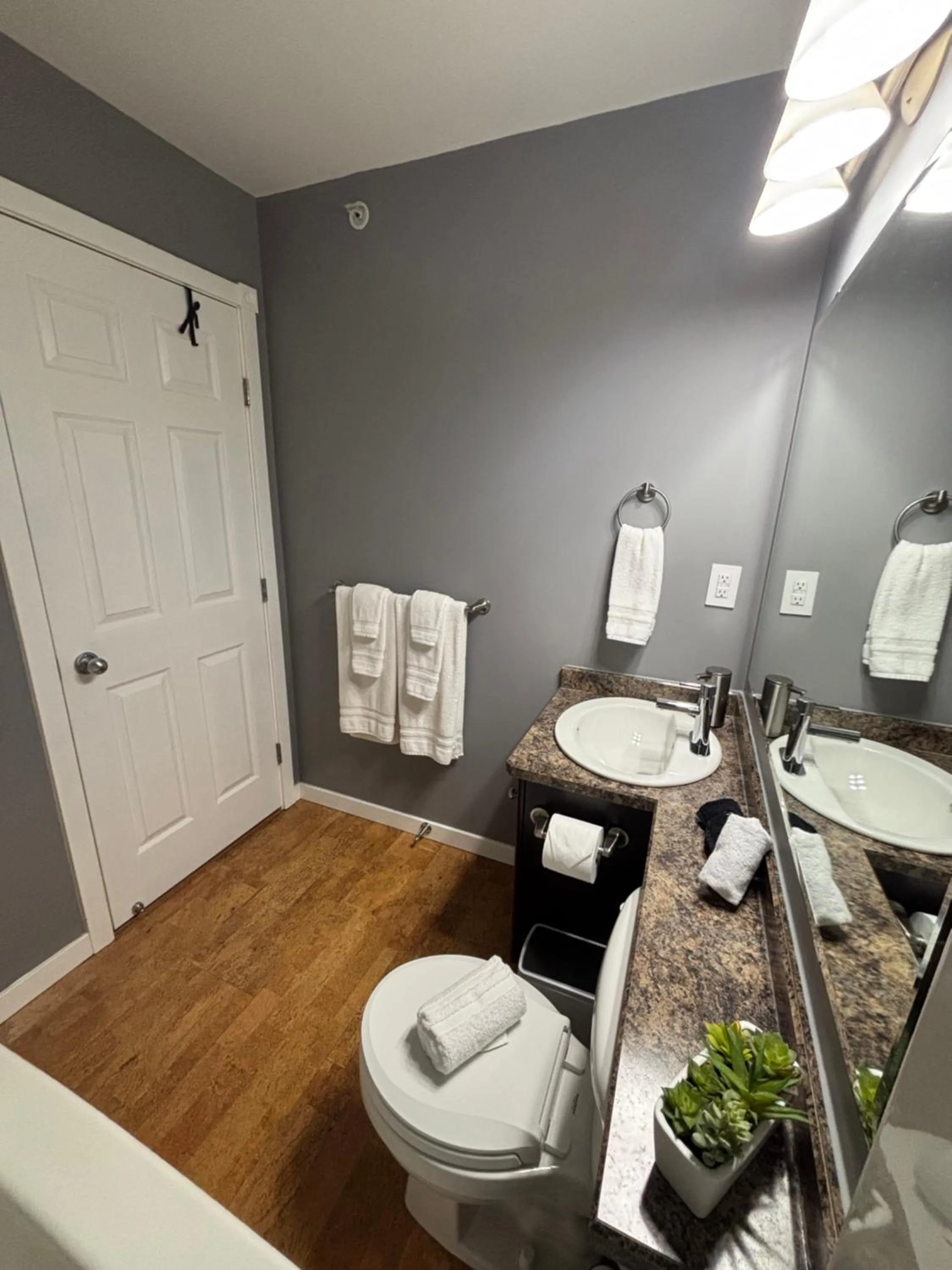 Bathroom in Top Floor Riverfront Condo with Stellar Sunsets!