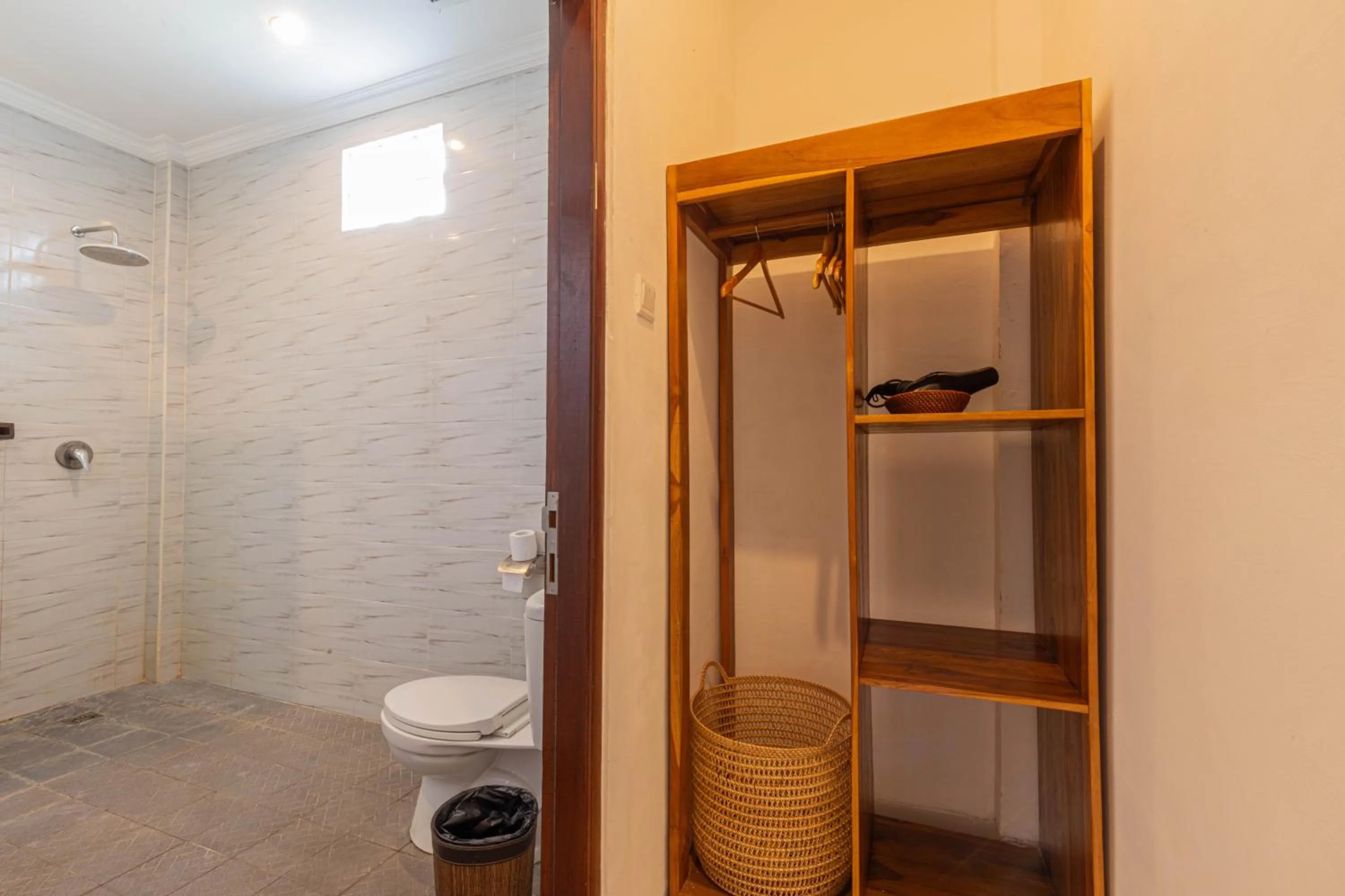 Toilet in Frangipani House and Spa by ecommerceloka