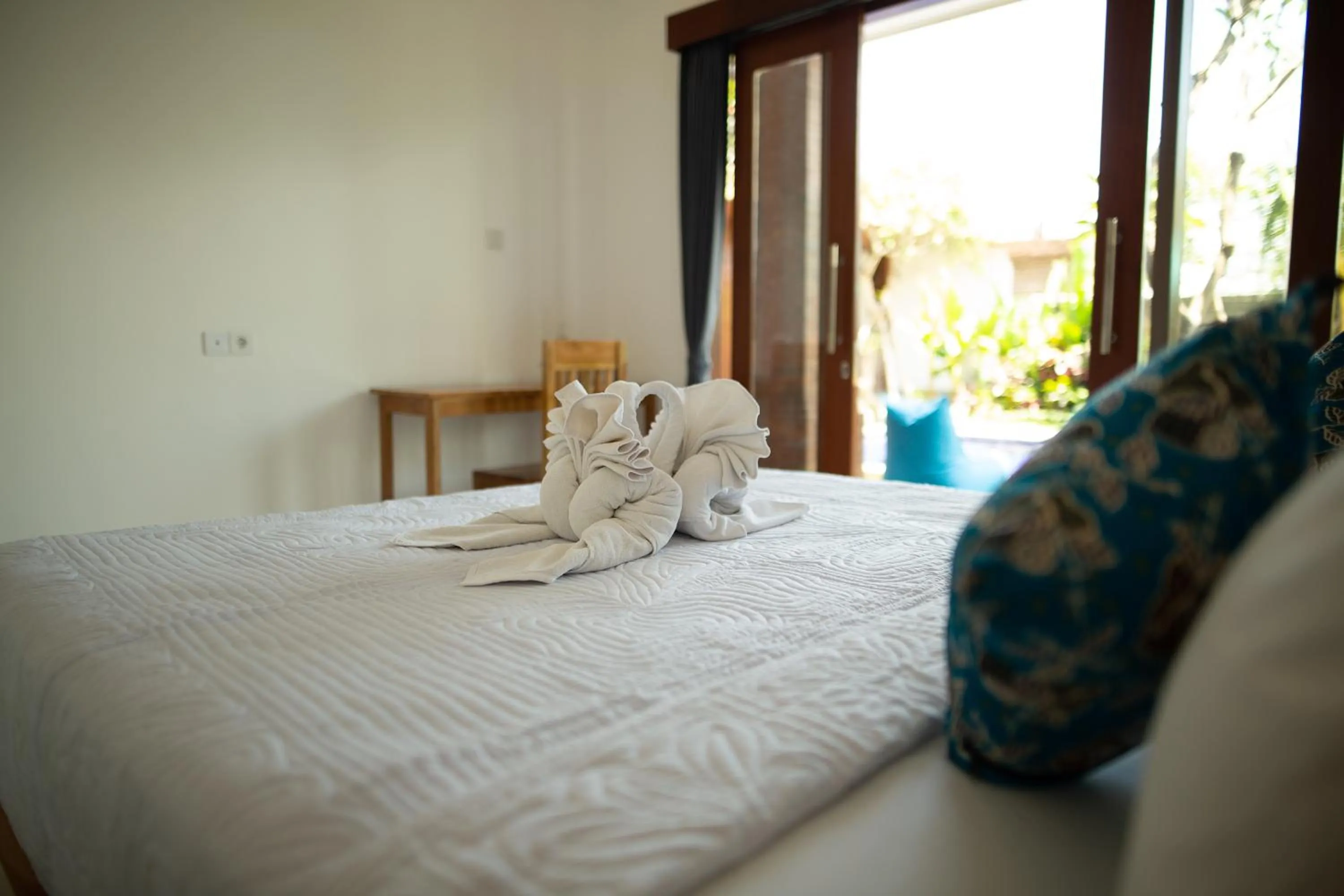 Bed in Frangipani House and Spa by ecommerceloka