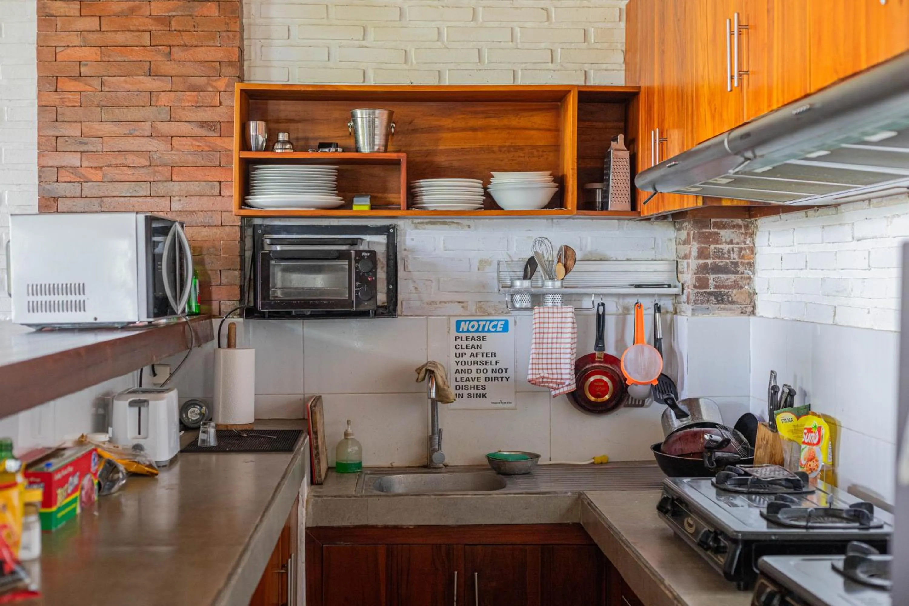 Communal kitchen in Frangipani House and Spa by ecommerceloka