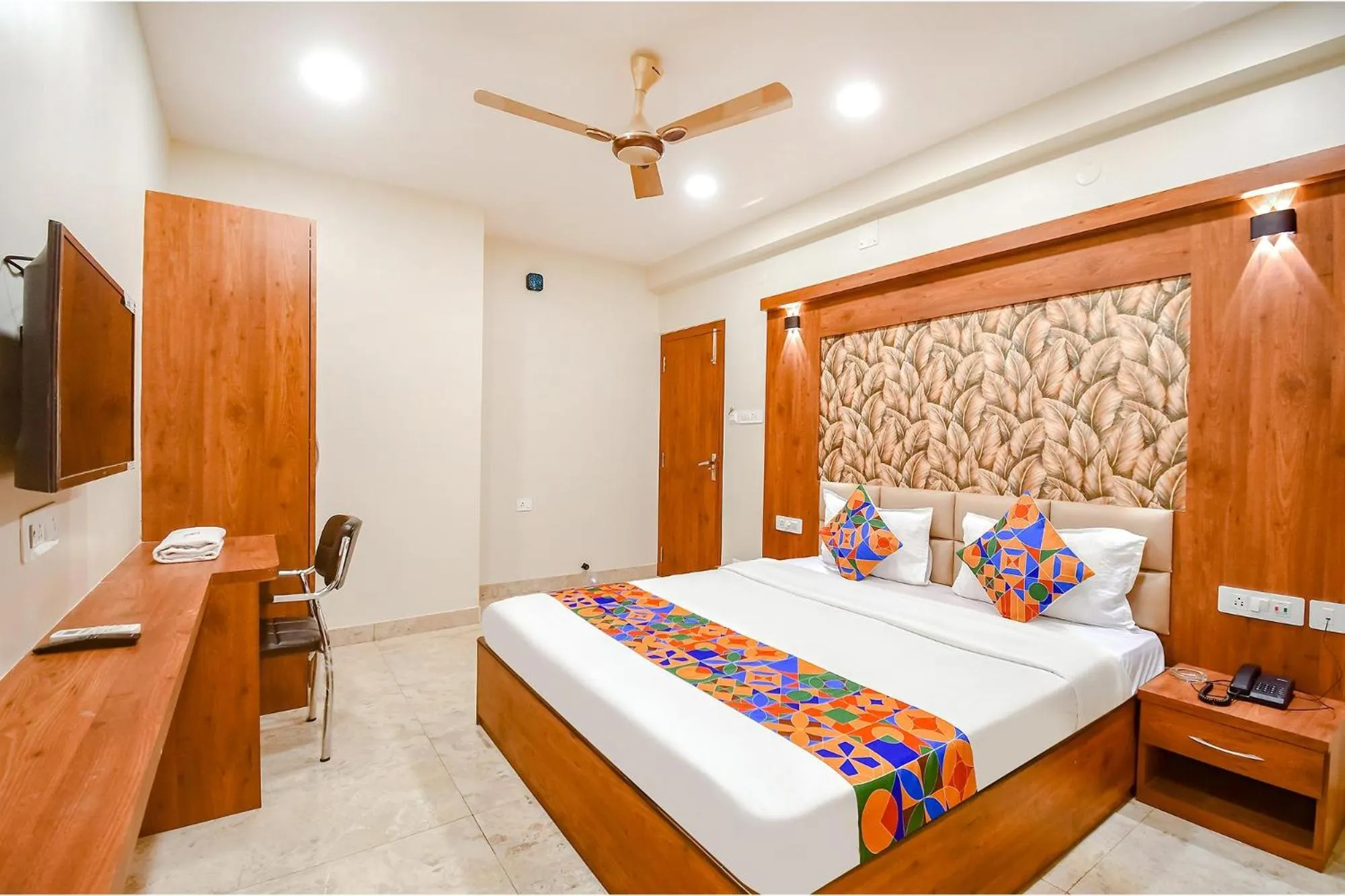 Bed in FabHotel Dreamworld Residency - Near Bisarjan Ghat