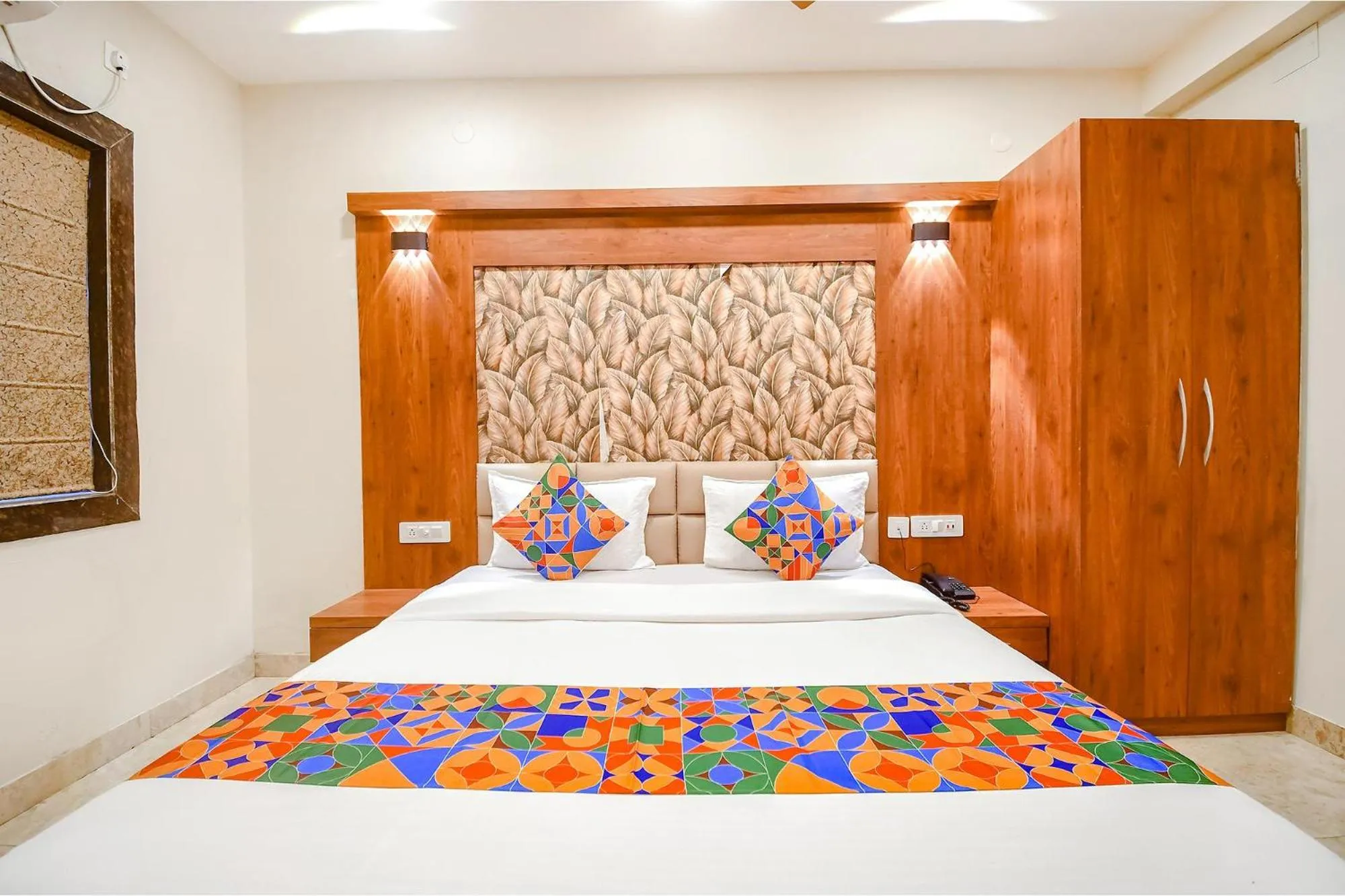 Bed in FabHotel Dreamworld Residency - Near Bisarjan Ghat