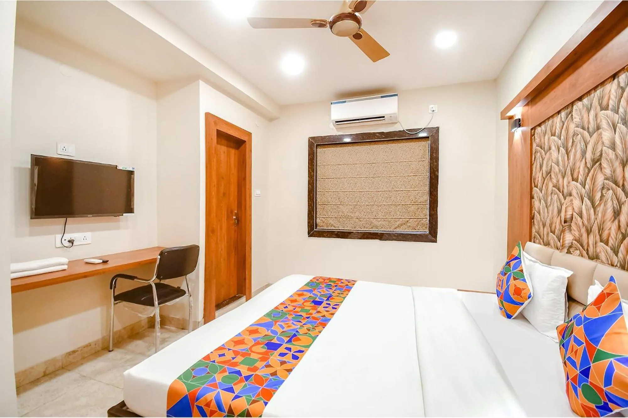 Bed in FabHotel Dreamworld Residency - Near Bisarjan Ghat