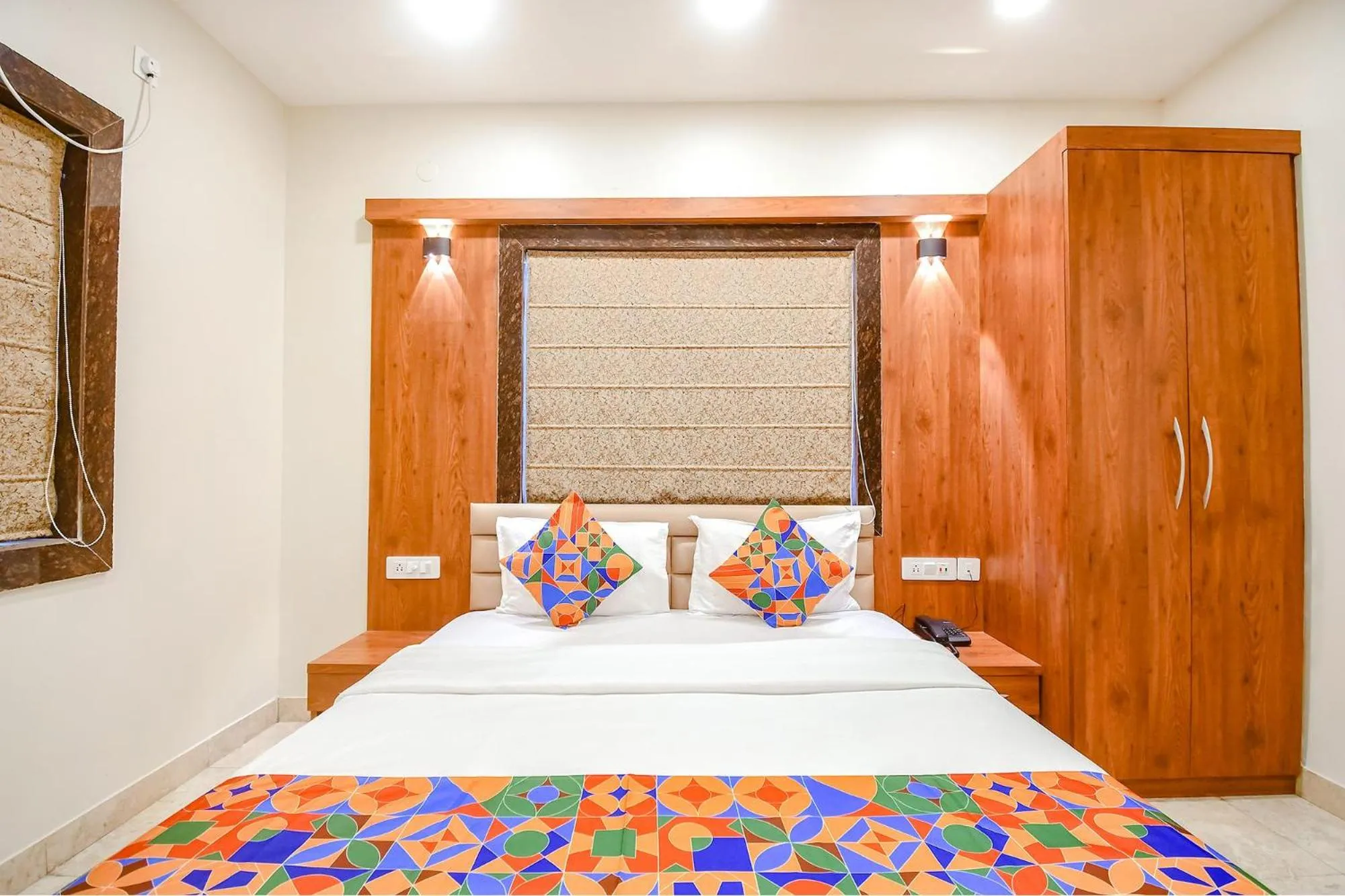 Bed in FabHotel Dreamworld Residency - Near Bisarjan Ghat