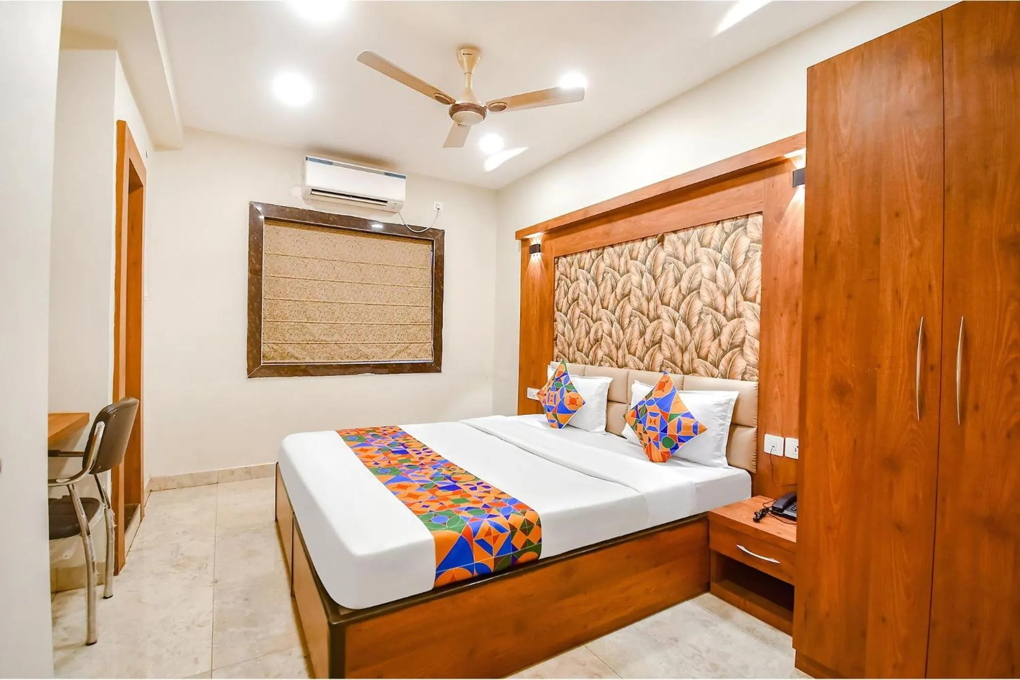 Bed in FabHotel Dreamworld Residency - Near Bisarjan Ghat
