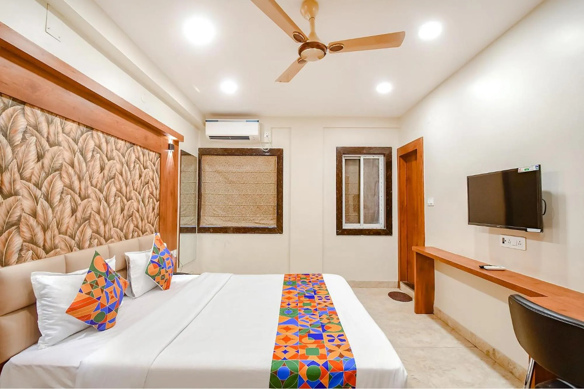 Bed in FabHotel Dreamworld Residency - Near Bisarjan Ghat