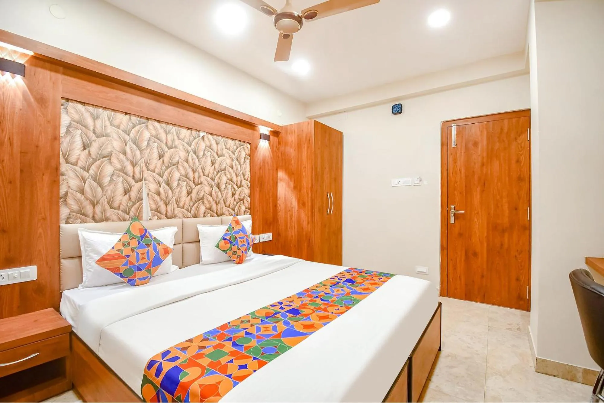 Bed in FabHotel Dreamworld Residency - Near Bisarjan Ghat
