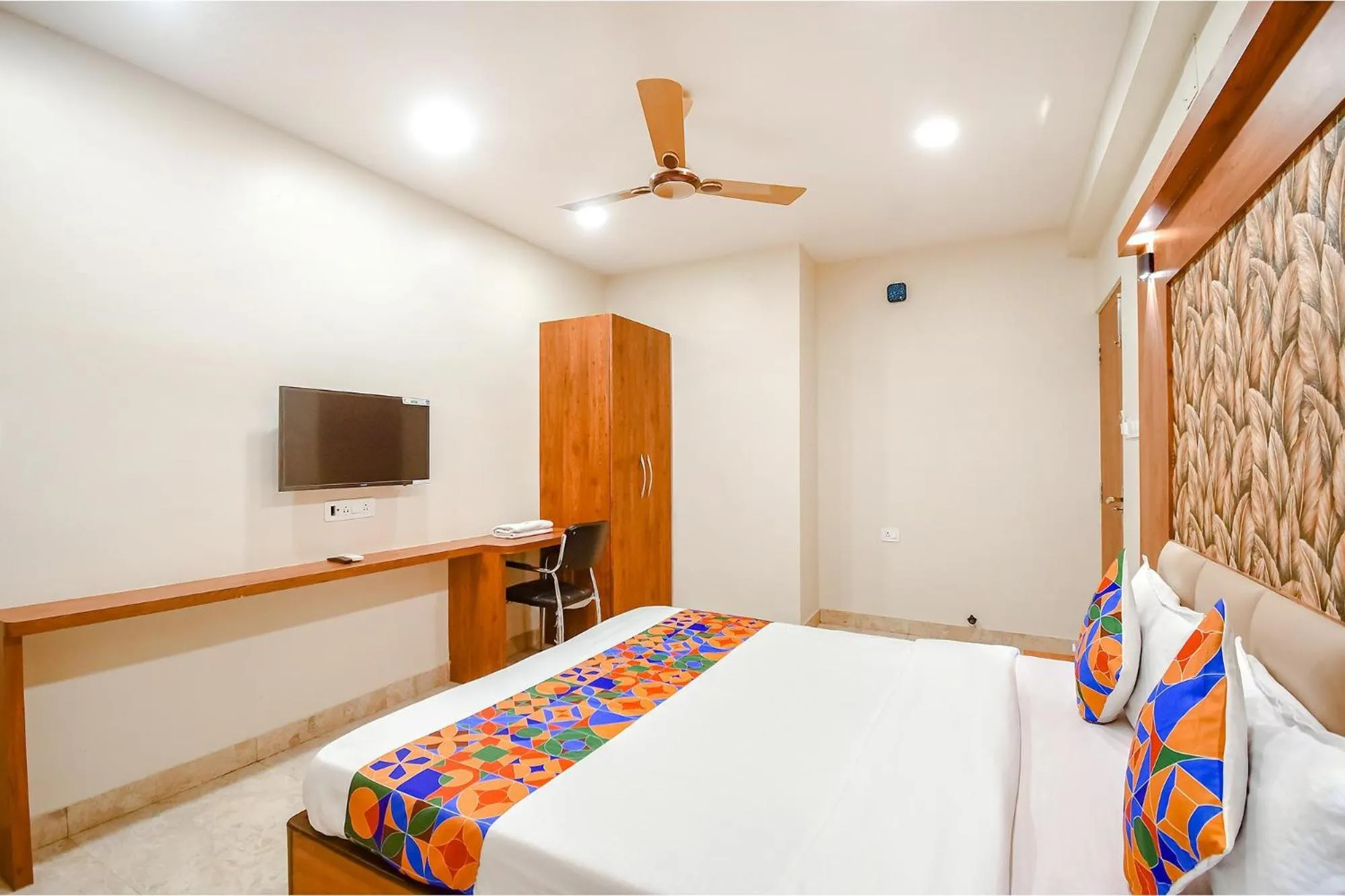 Bed in FabHotel Dreamworld Residency - Near Bisarjan Ghat