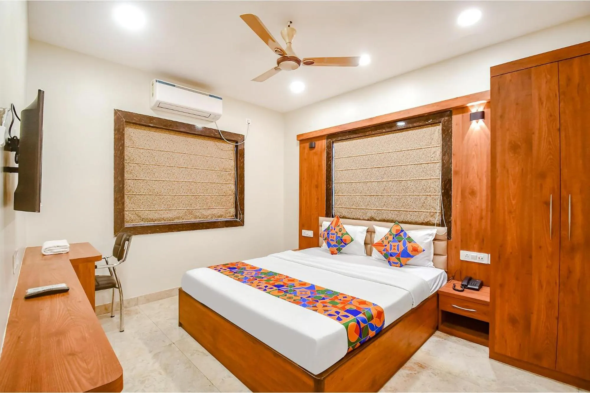 Bed in FabHotel Dreamworld Residency - Near Bisarjan Ghat