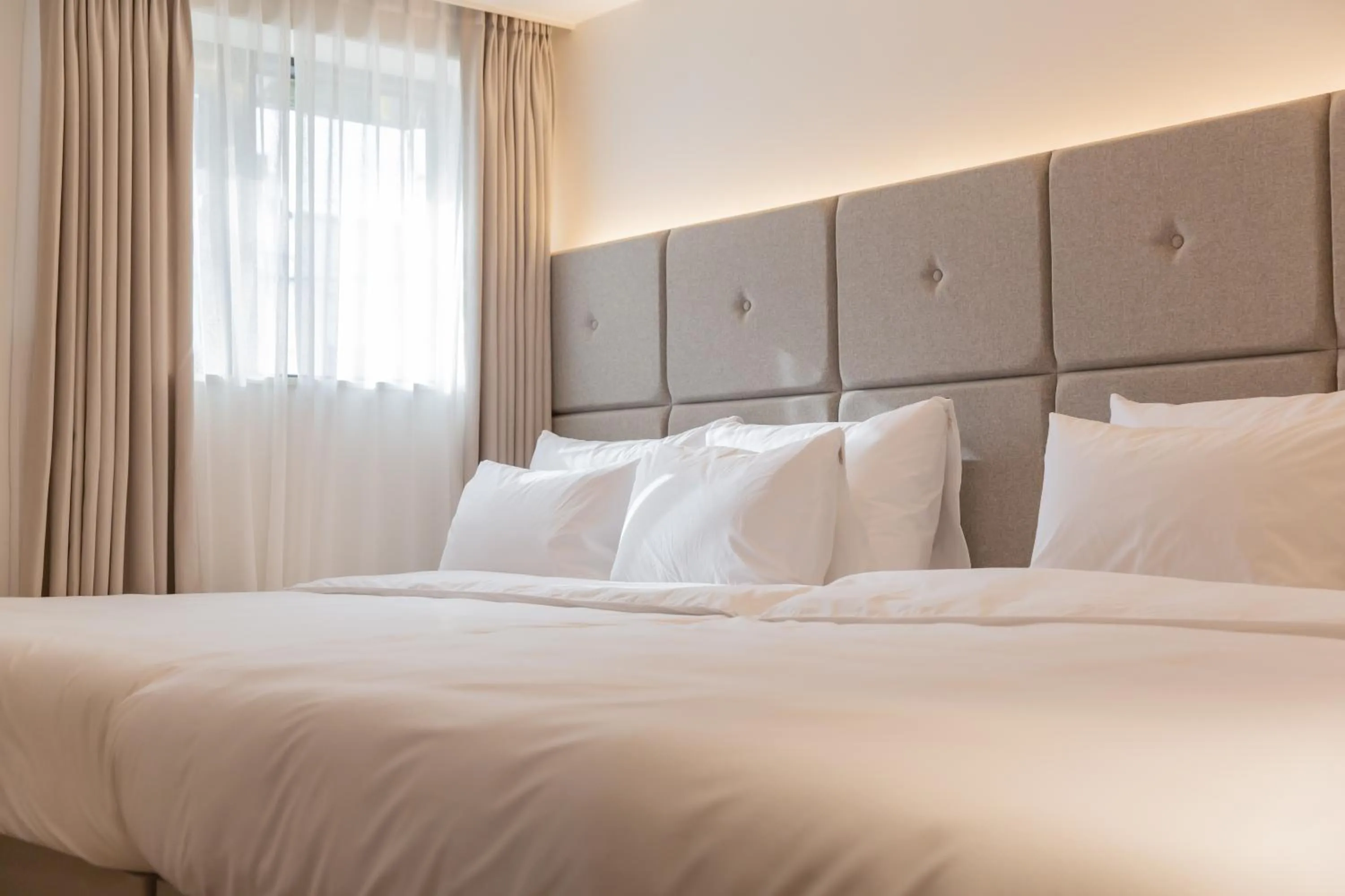 Bed in Denbasta Hotel Heritage