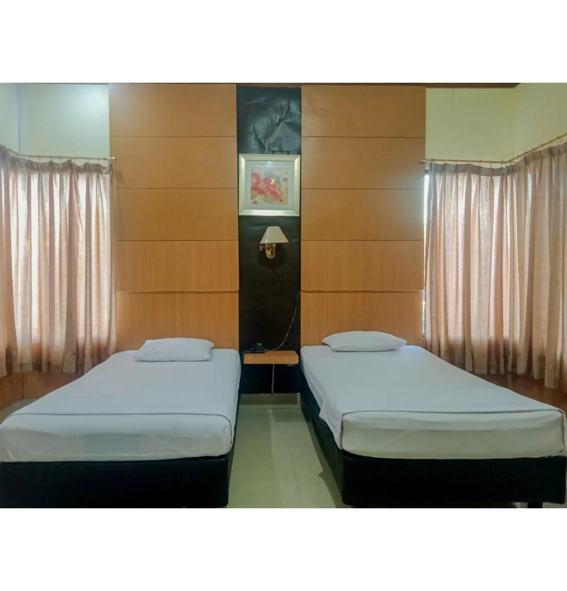 Bedroom, Bed in Homestay Akik Hijau Near Panakkukang