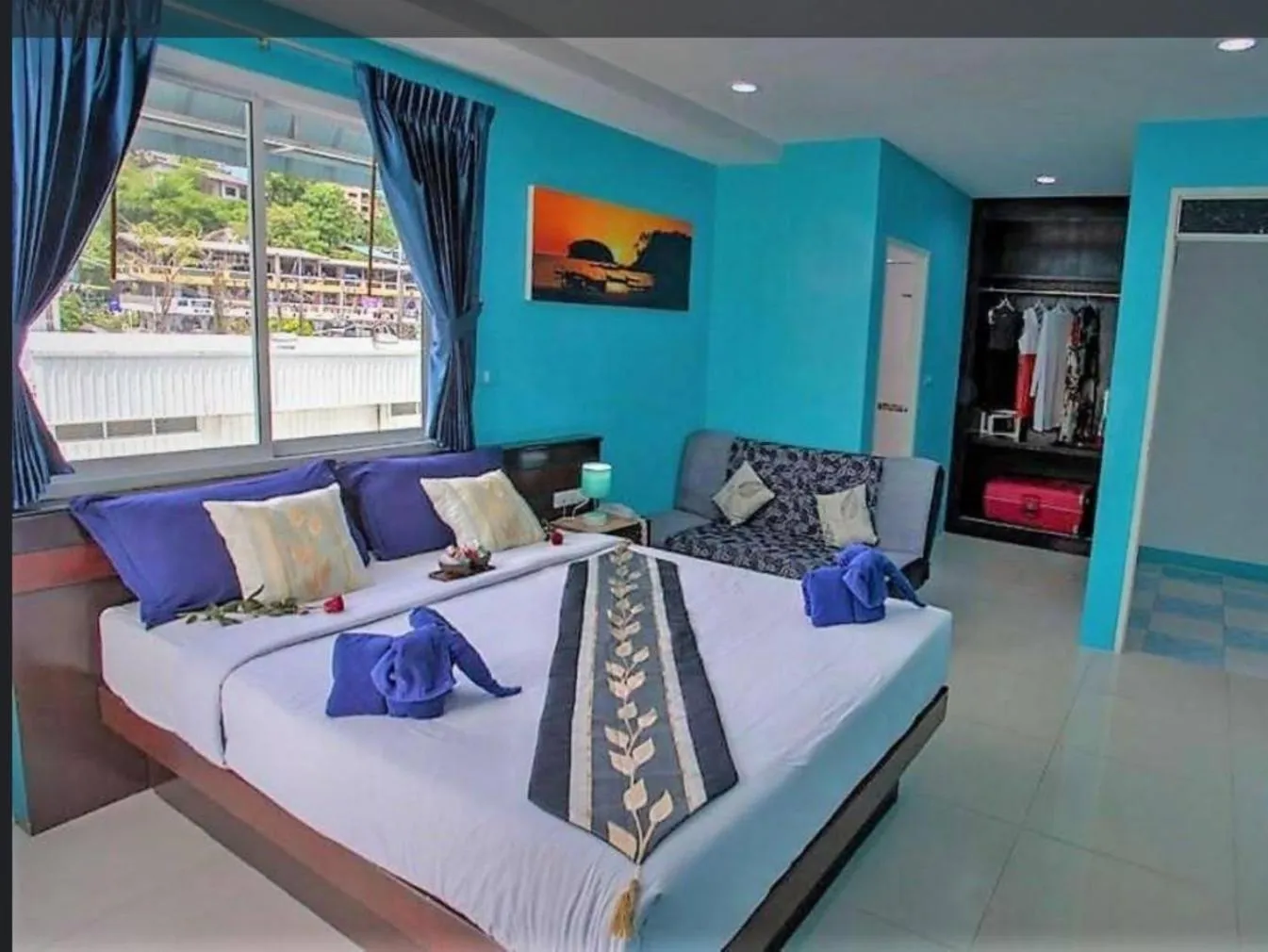 Bed in PATONG BLUE HOTEL