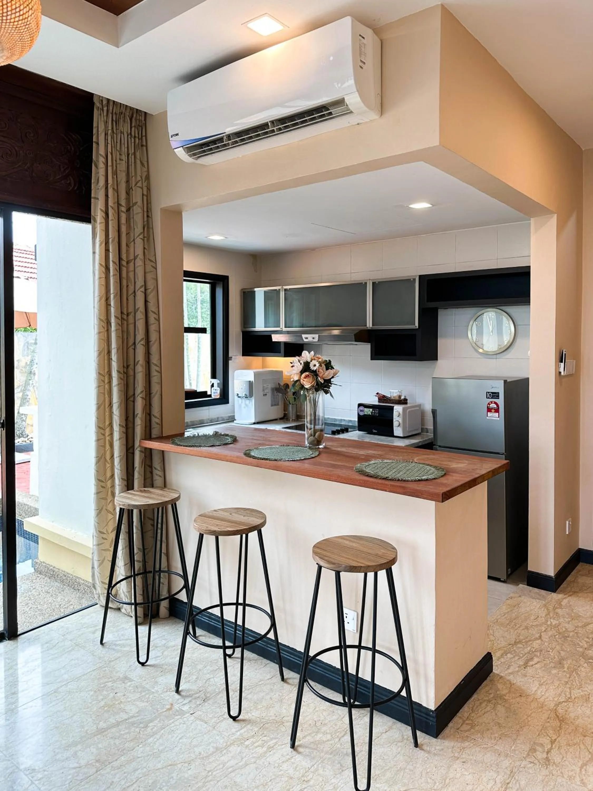 Kitchen or kitchenette in Bonheur at Karambunai