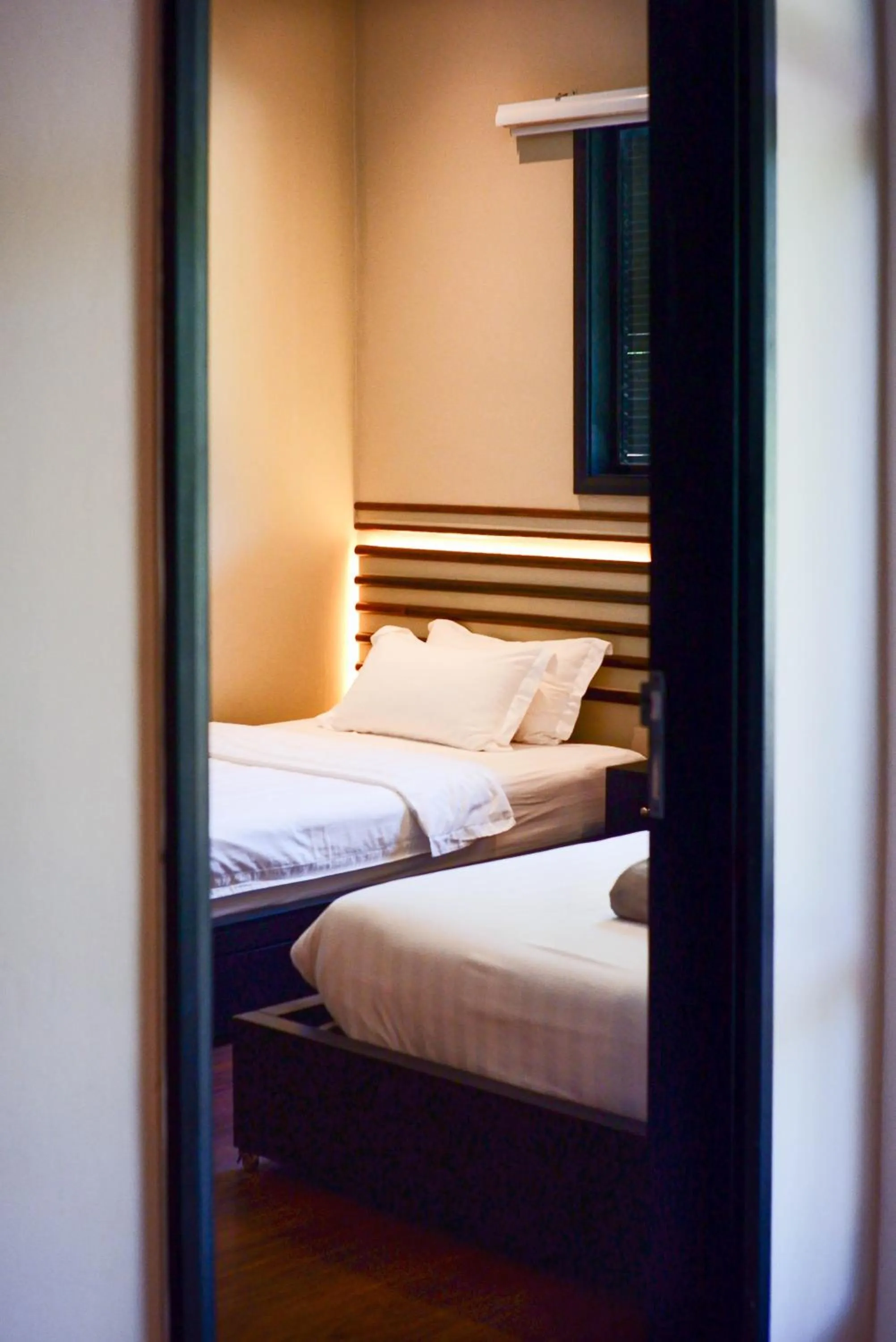 Bed in Bonheur at Karambunai