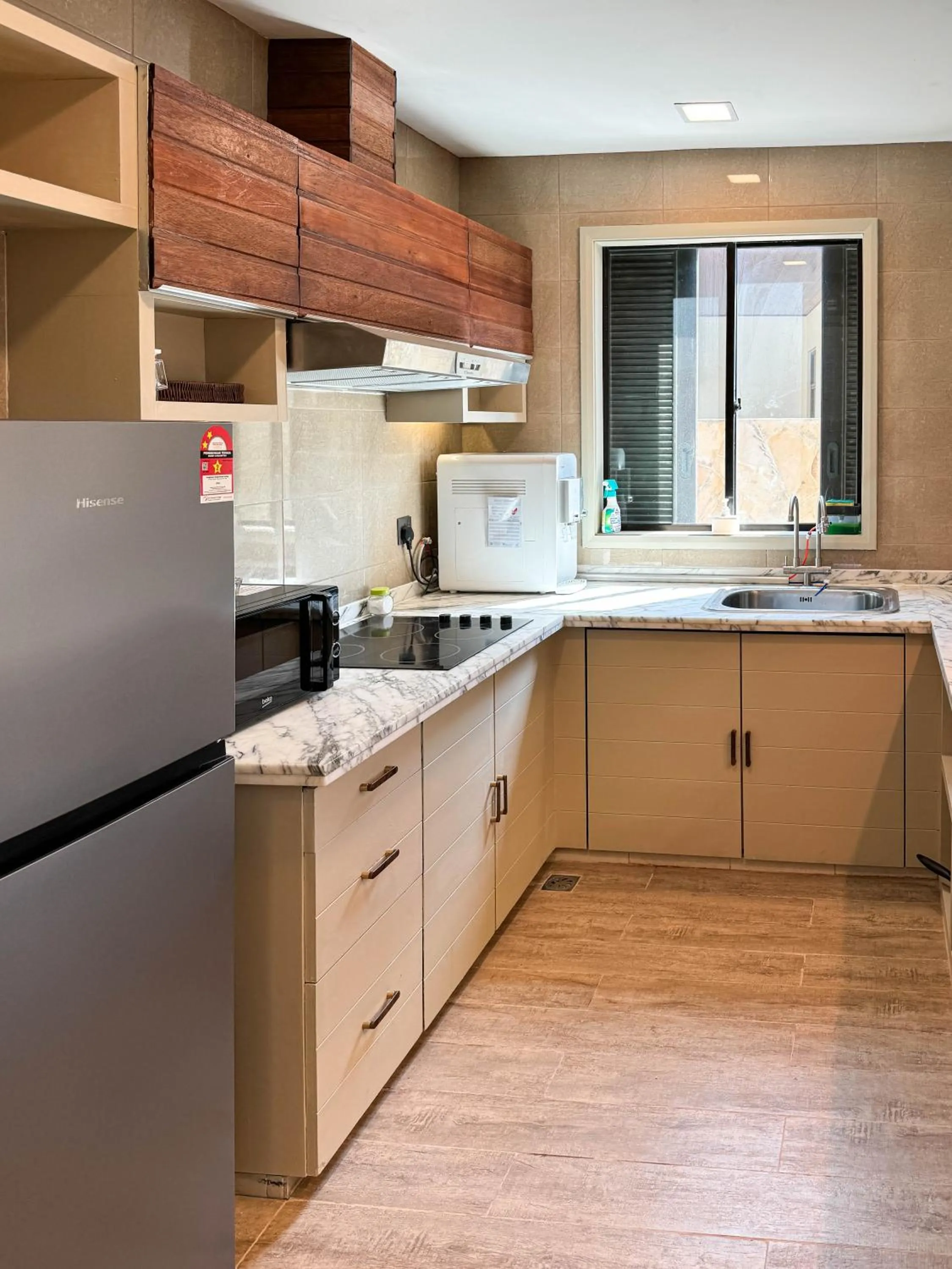 Kitchen or kitchenette in Bonheur at Karambunai