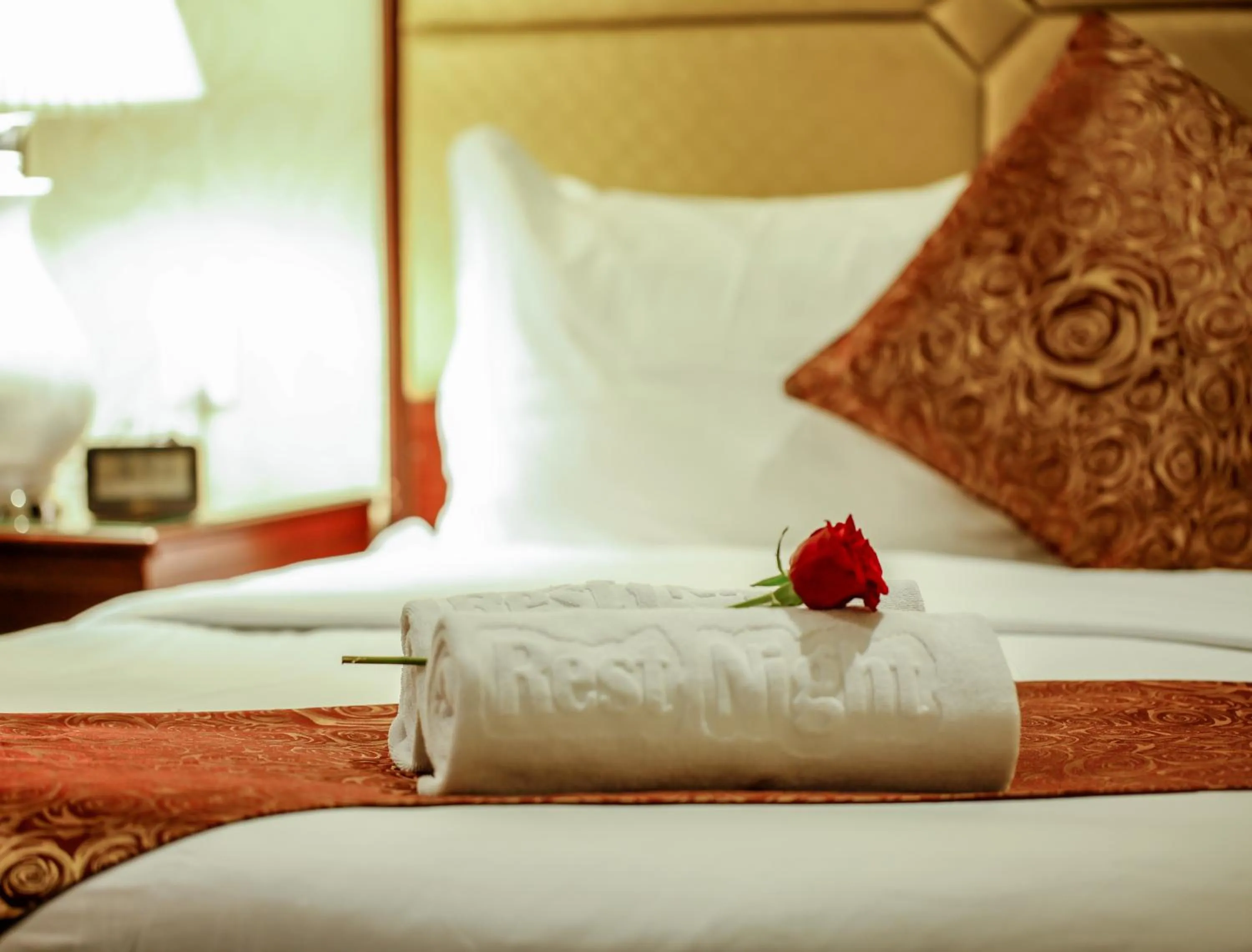 Decorative detail, Bed in Rest Night Serviced Apartments- AlHamra