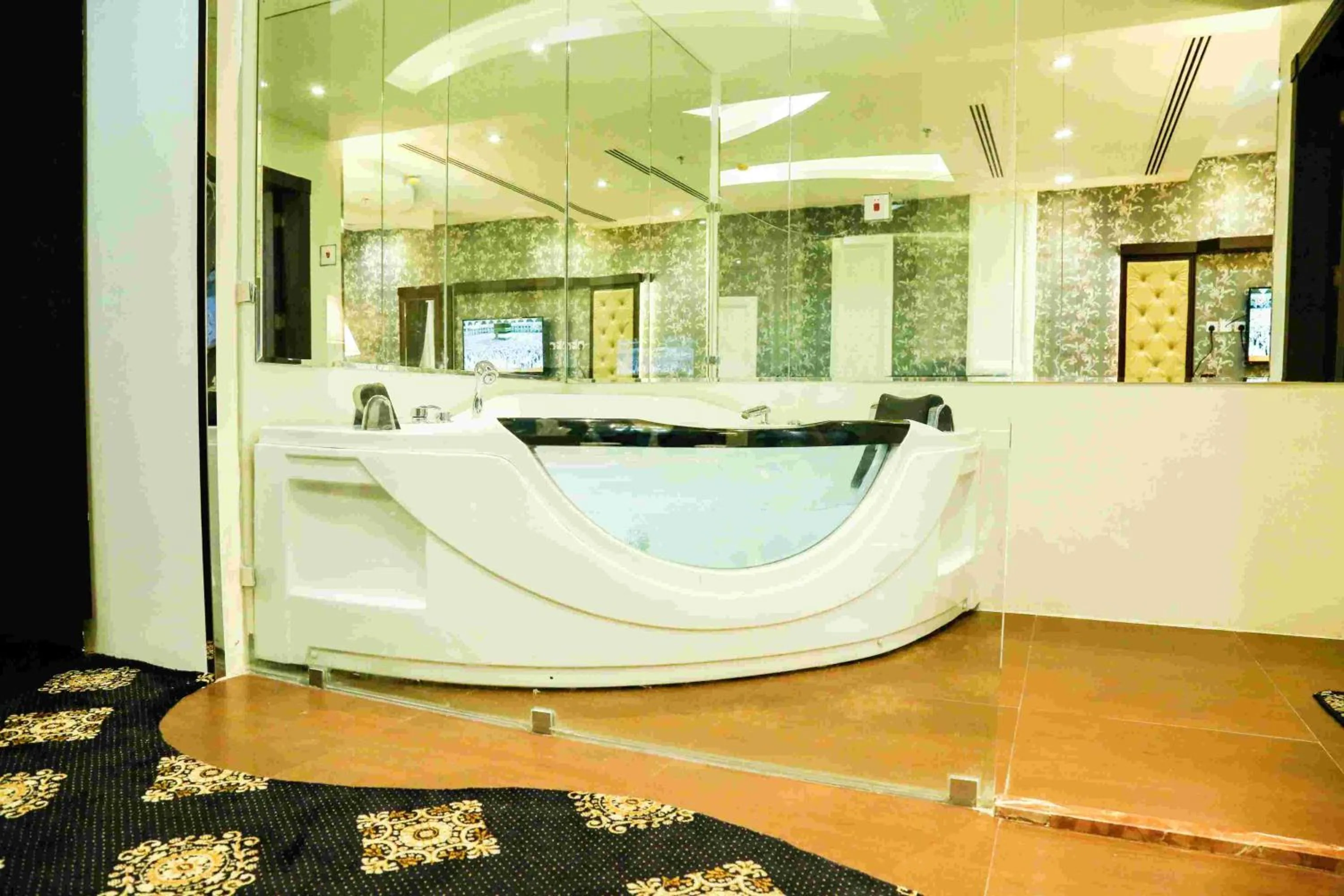 Hot Tub in Rest Night Serviced Apartments- AlHamra