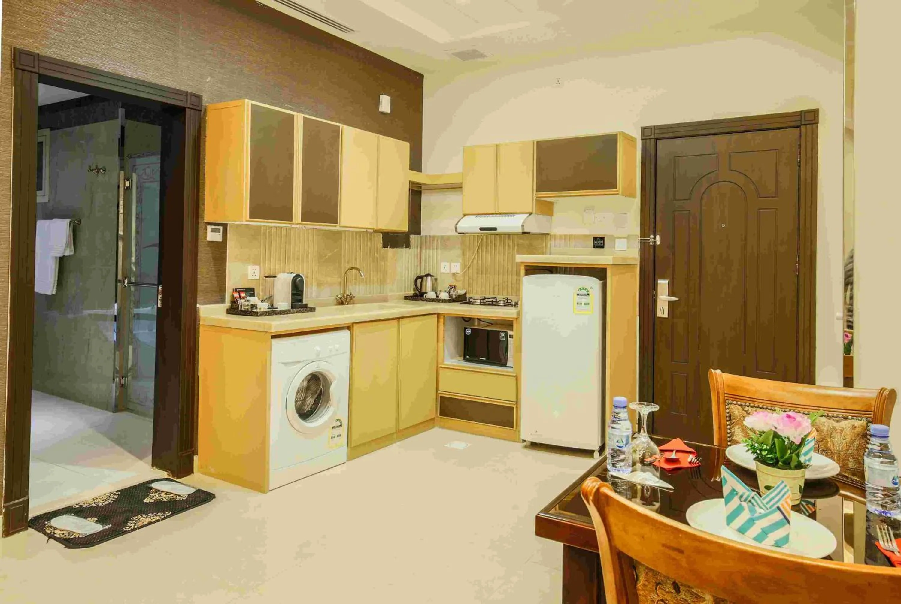 Kitchen or kitchenette in Rest Night Serviced Apartments- AlHamra