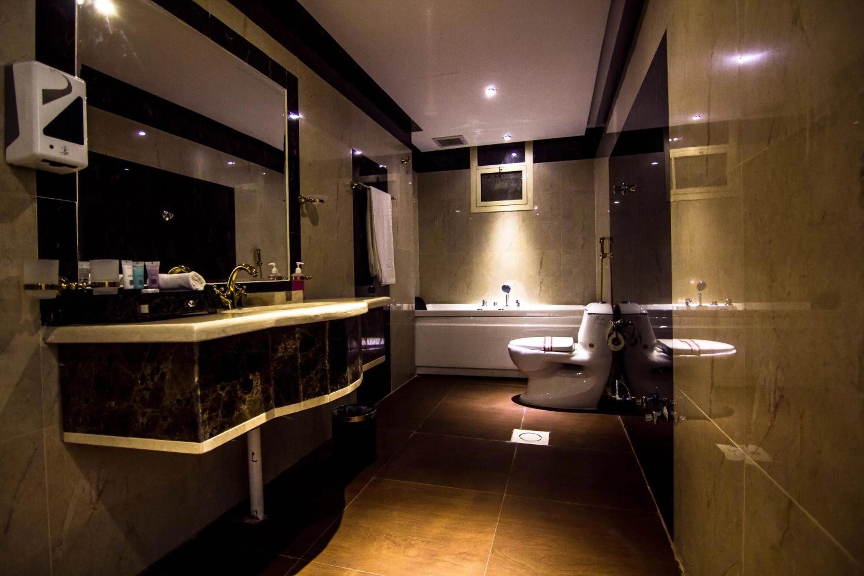 Bathroom in Rest Night Serviced Apartments- AlHamra