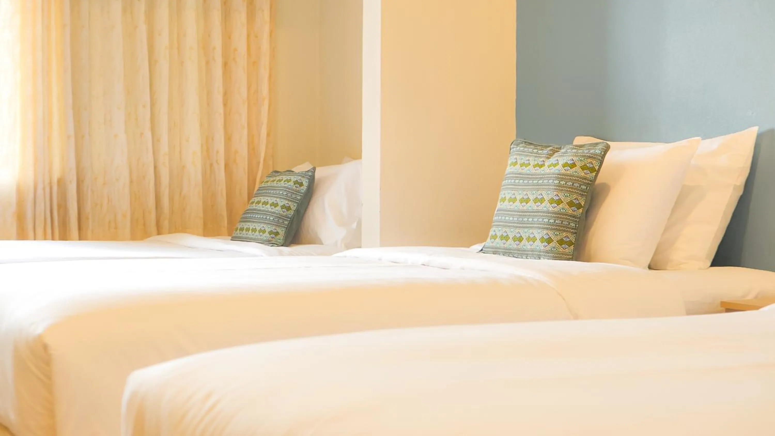 Bed in Siam Avari Hotel, Chiang Rai