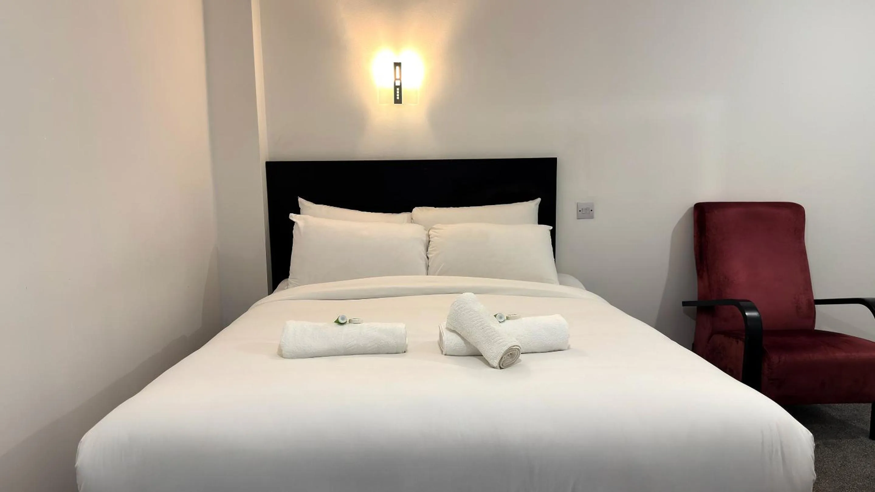 Bed in Lord Nelson Hotel by Compass Hospitality